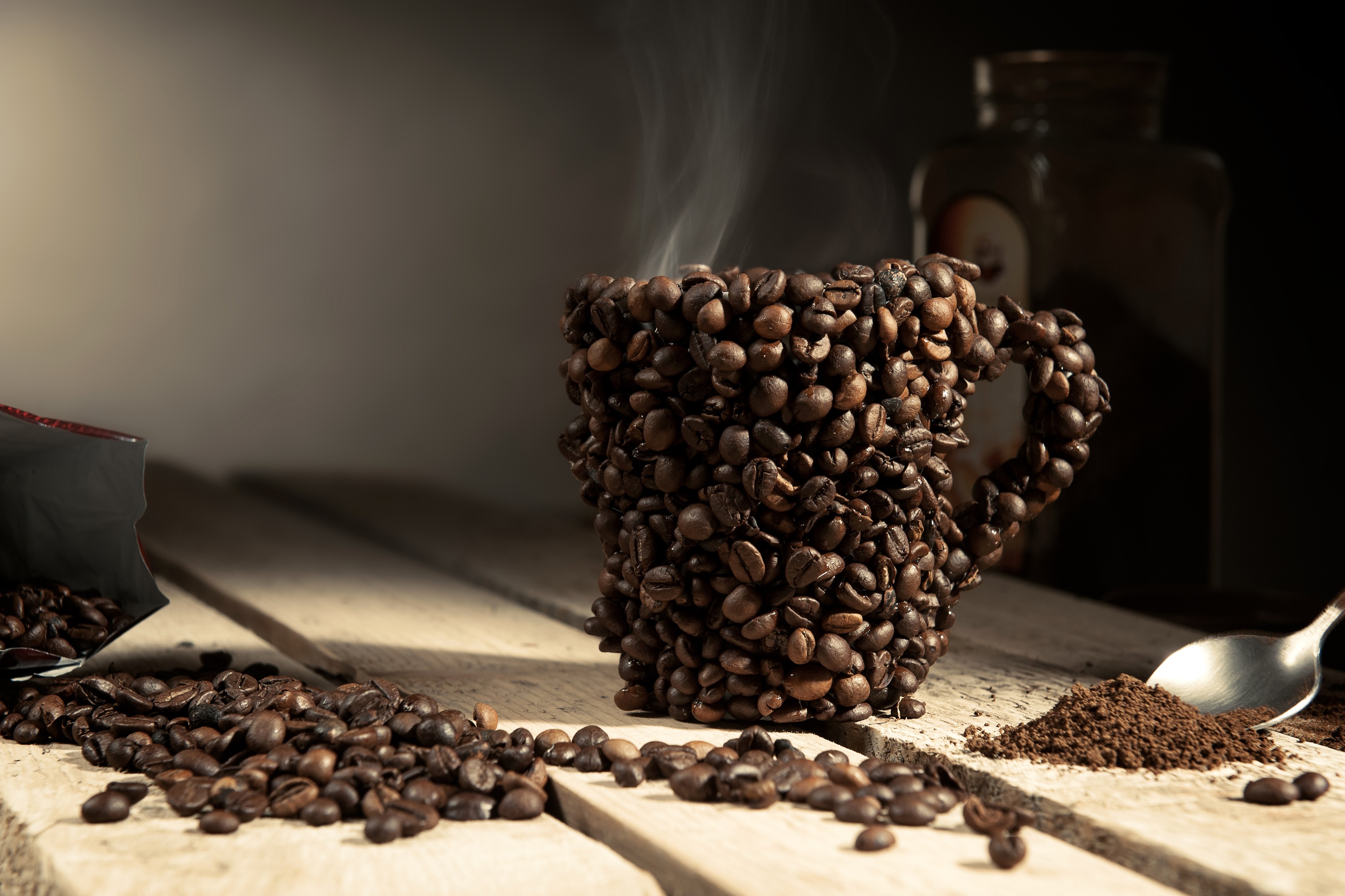 Coffee cup made of coffee beans with steam HD Wallpaper