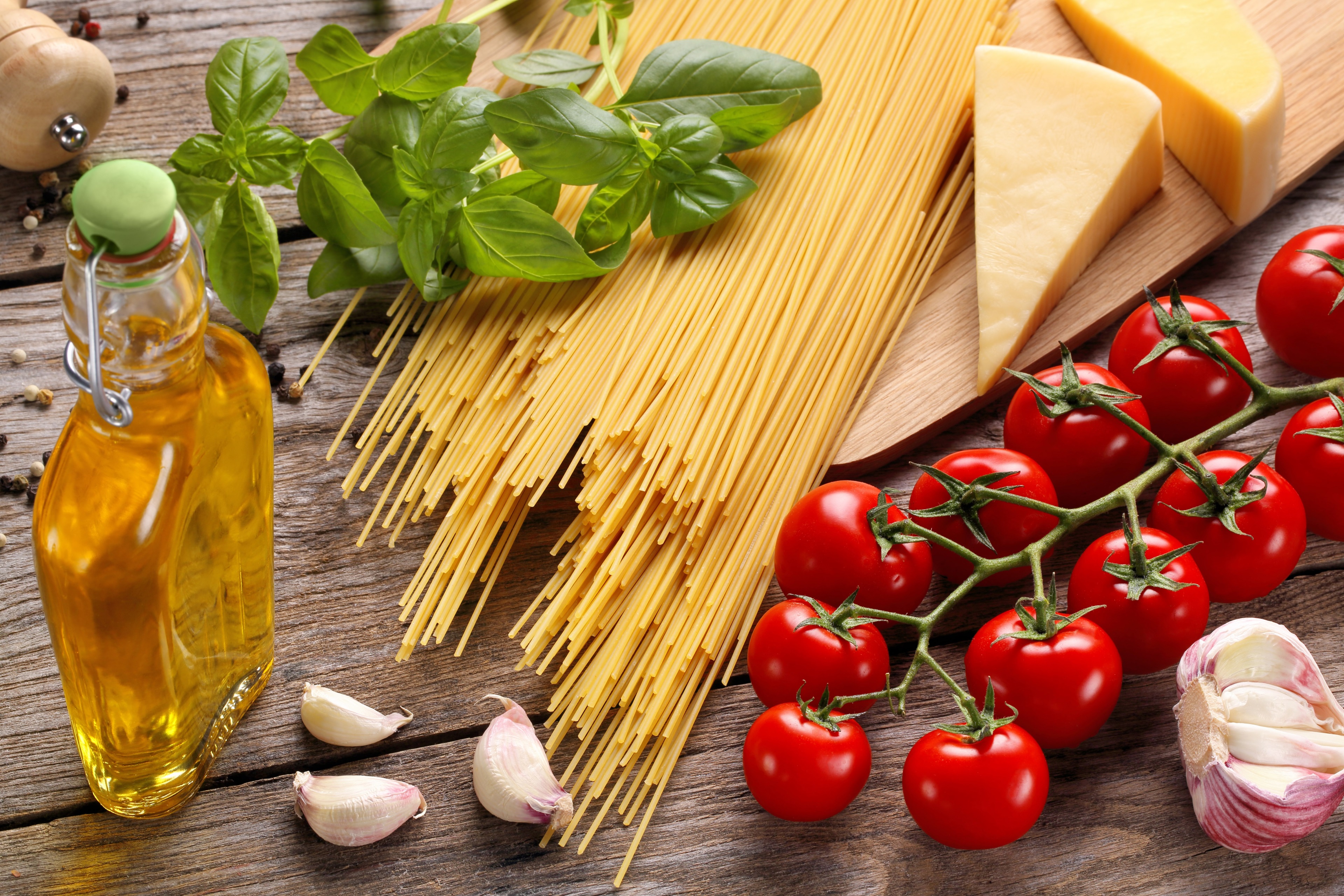 Still life with spaghetti, tomatoes, cheese, garlic, and olive oil HD Wallpaper
