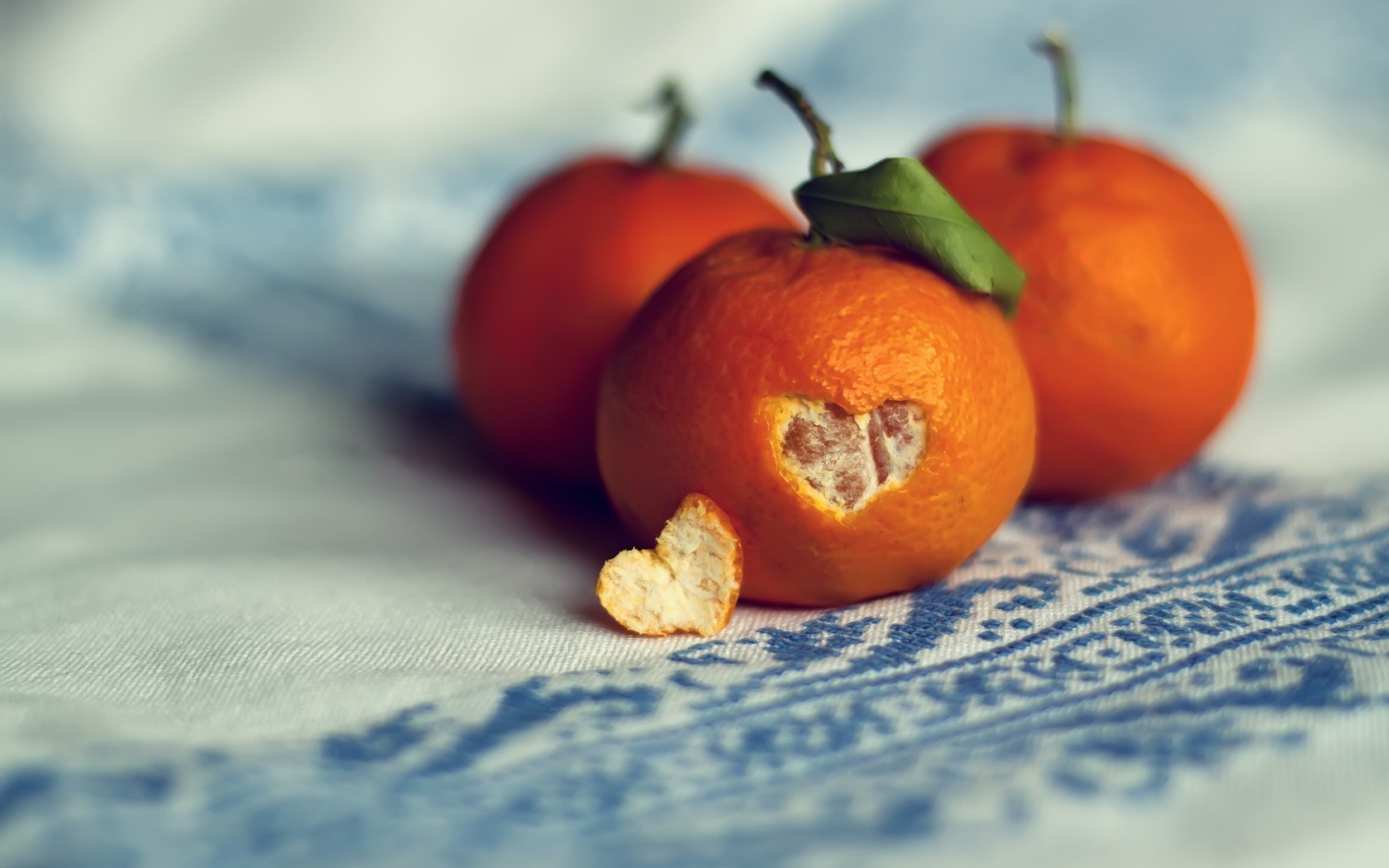 Clementines with a heart carved into one HD Wallpaper