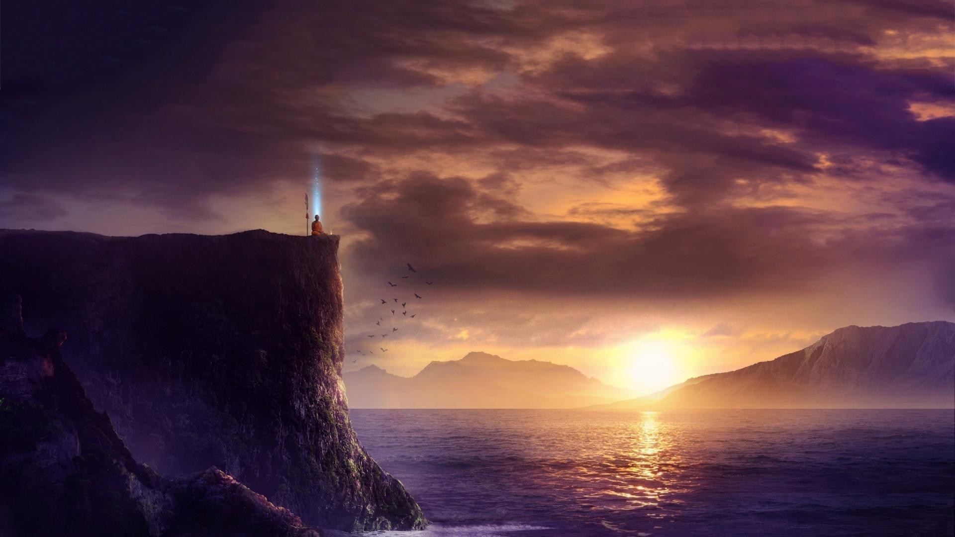 Monk meditating on a cliff at sunset HD Wallpaper