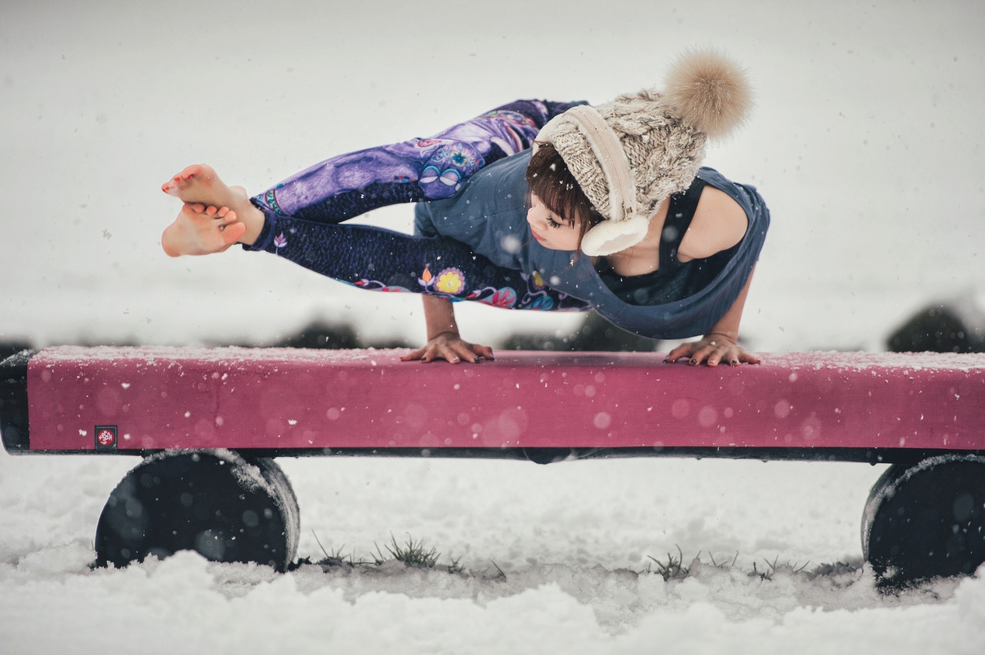 Woman doing yoga in the snow HD Wallpaper