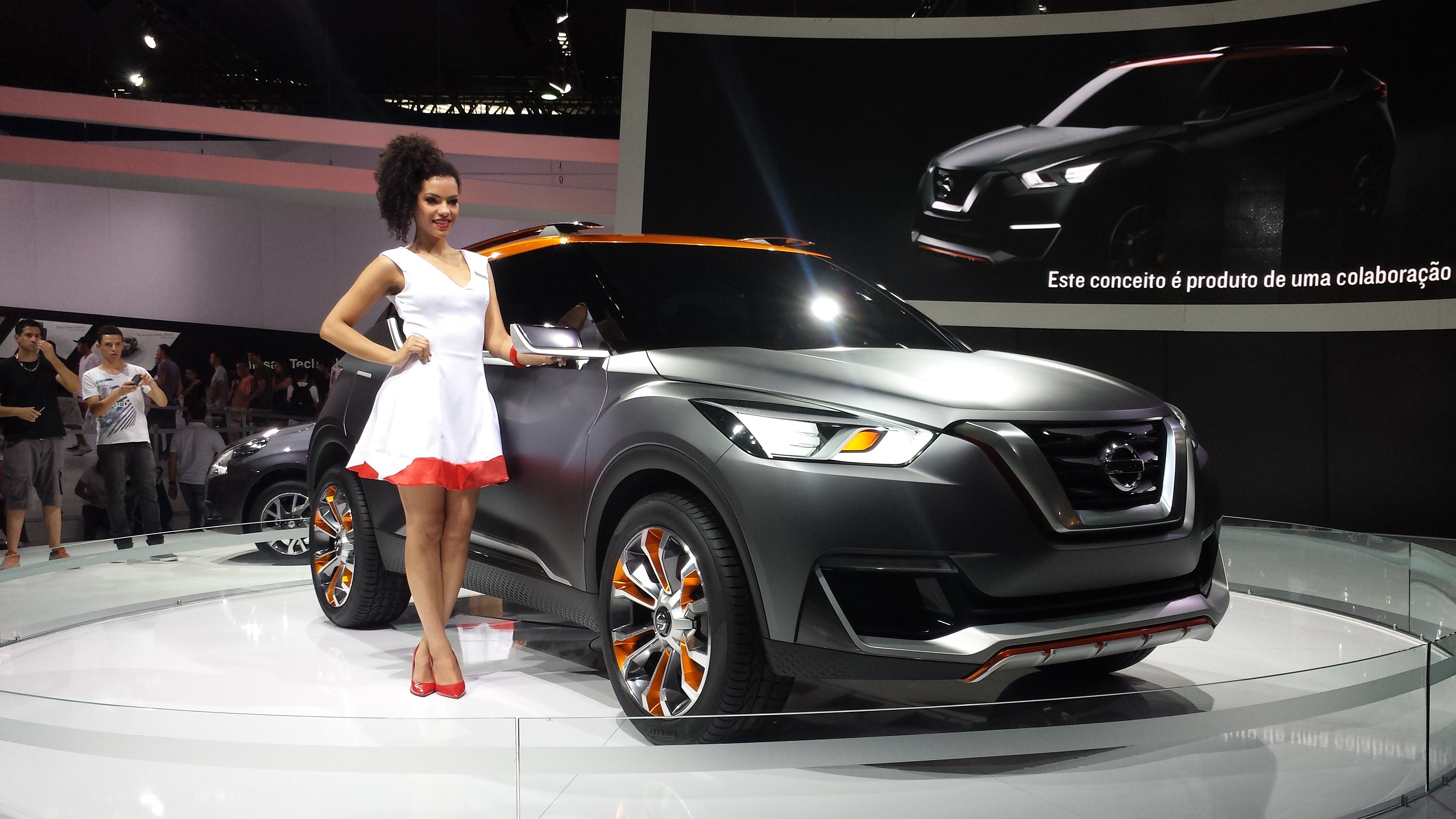 Nissan Kicks concept car with a model HD Wallpaper