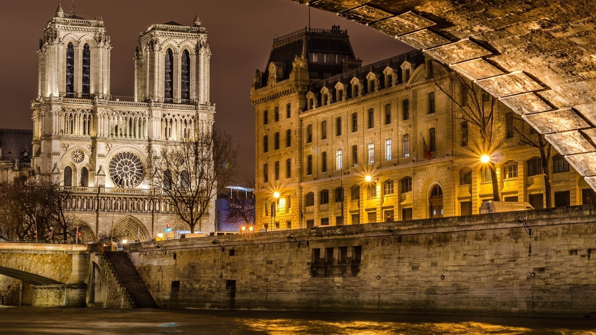 Notre Dame Cathedral and building at night over the Seine River, Paris HD Wallpaper