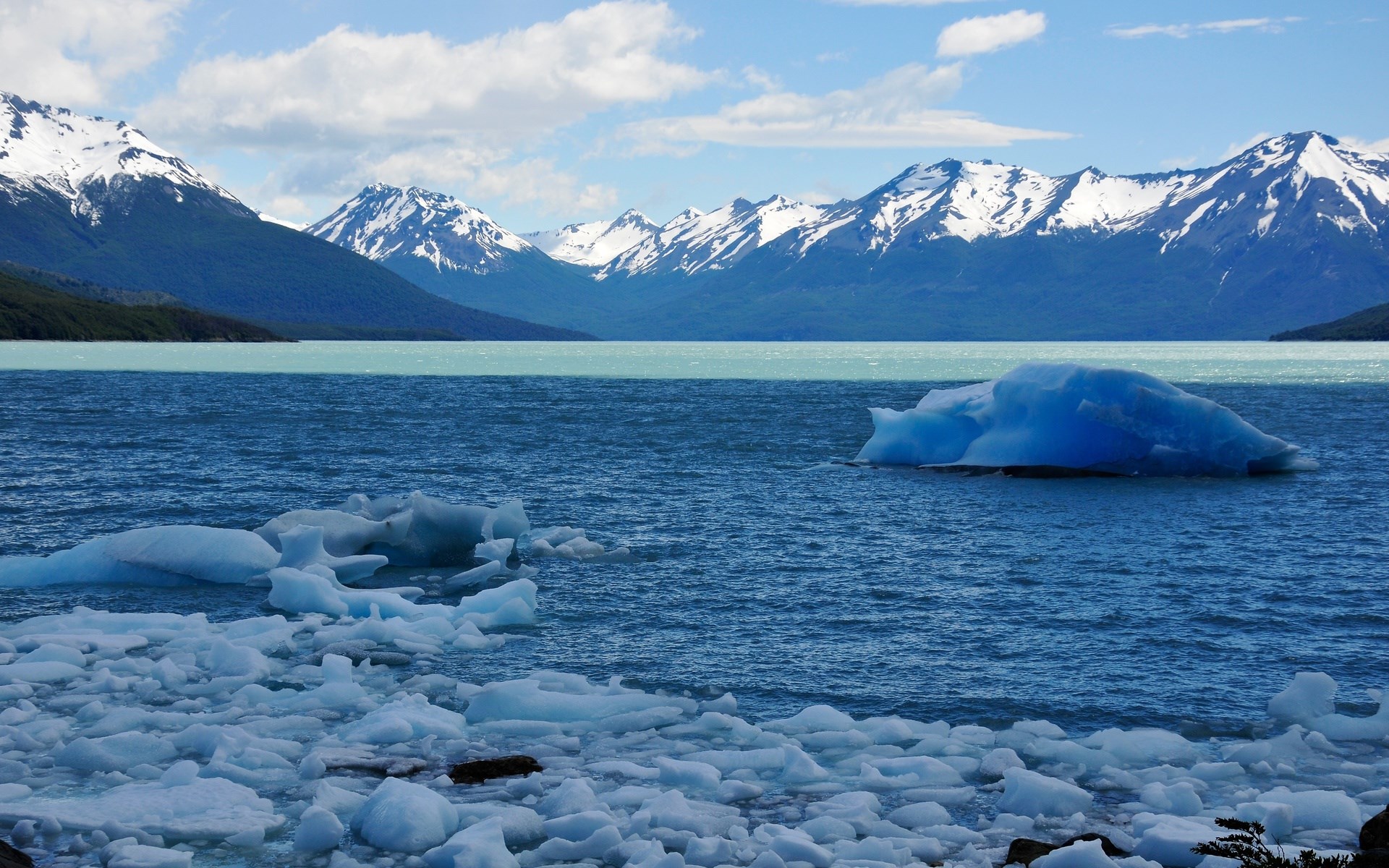 Icebergs on a lake with snow-capped mountains HD Wallpaper