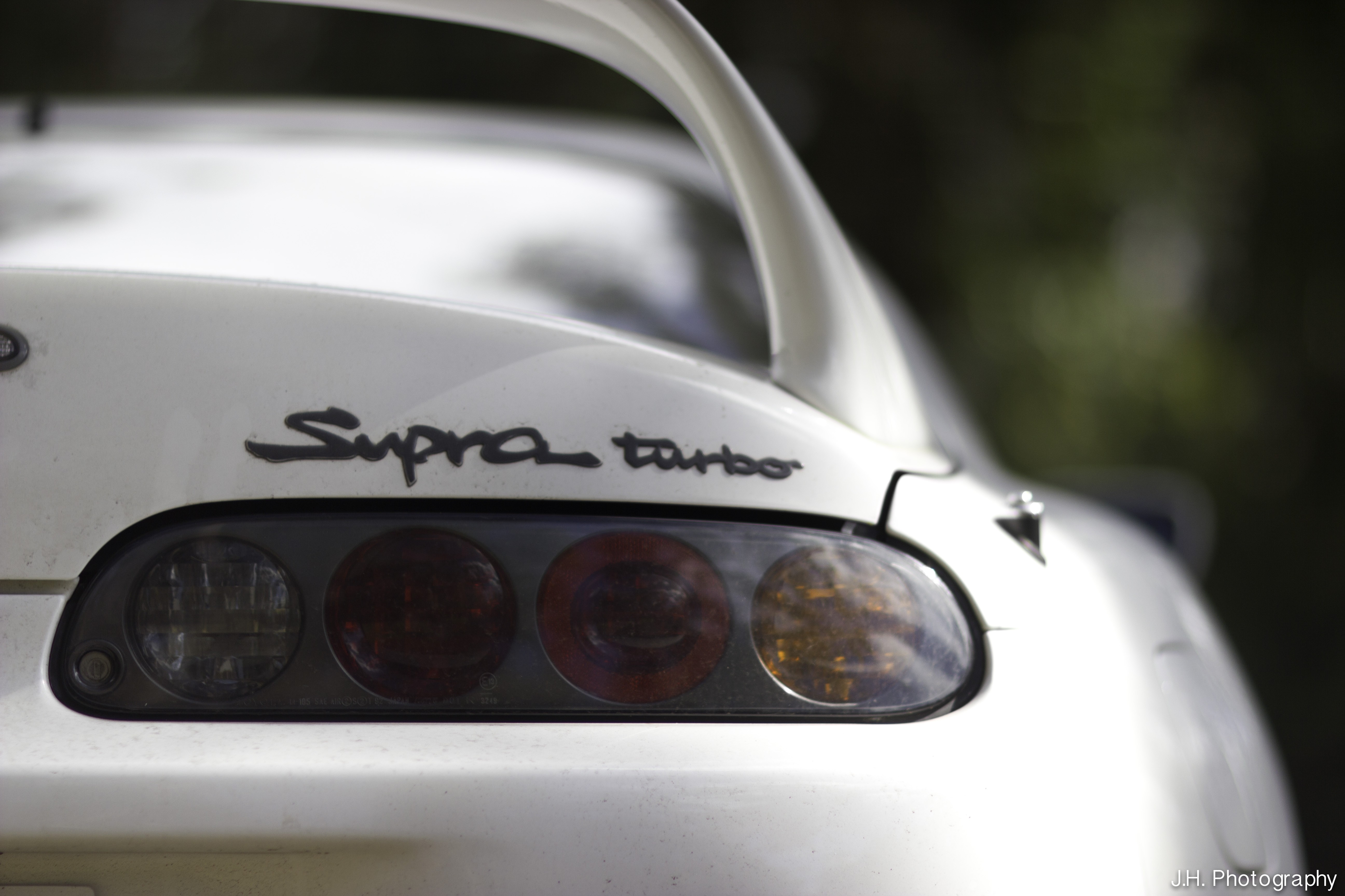White Toyota Supra Turbo with spoiler and taillights HD Wallpaper