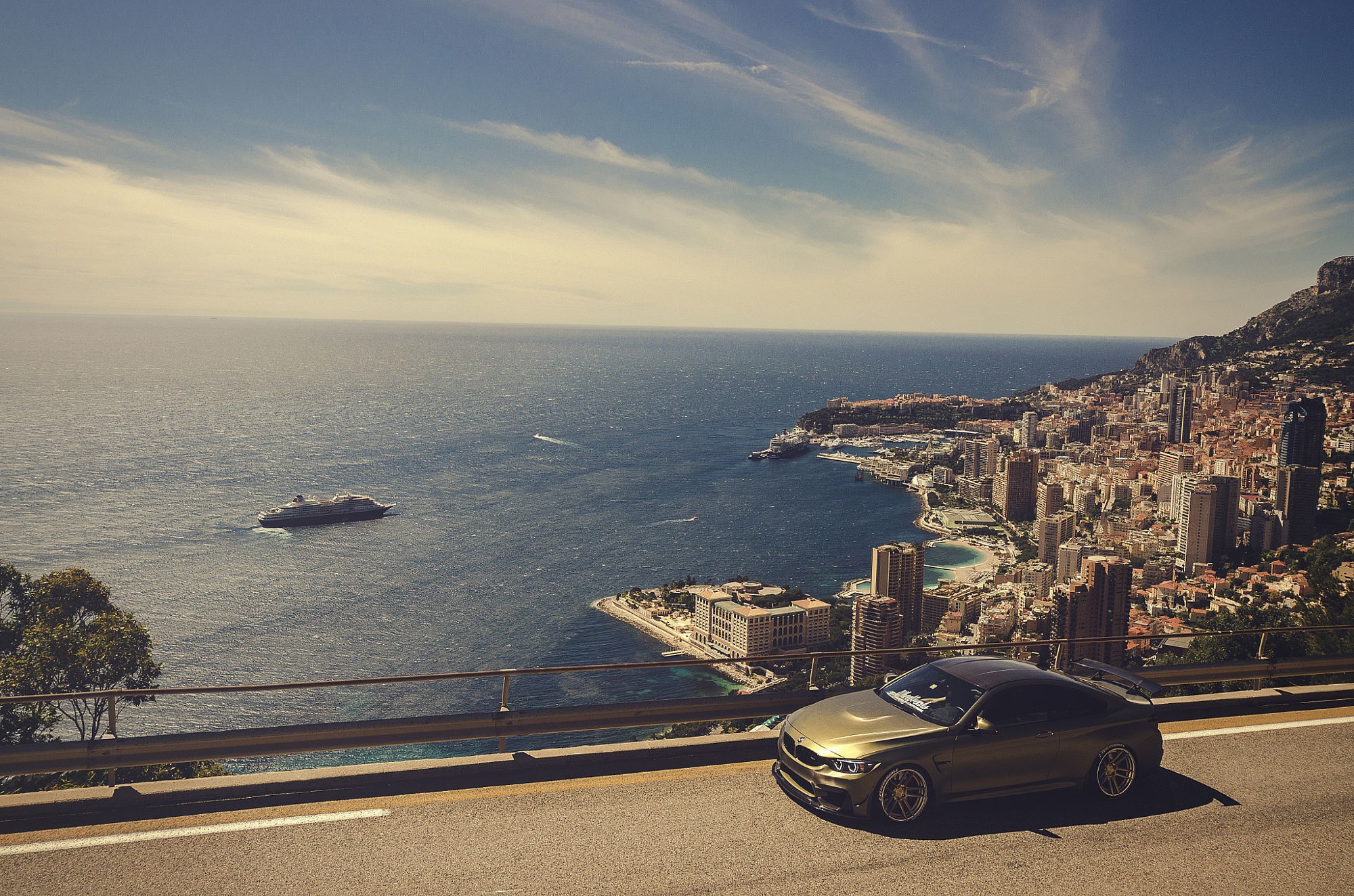 BMW car overlooking Monaco coastline with a yacht HD Wallpaper