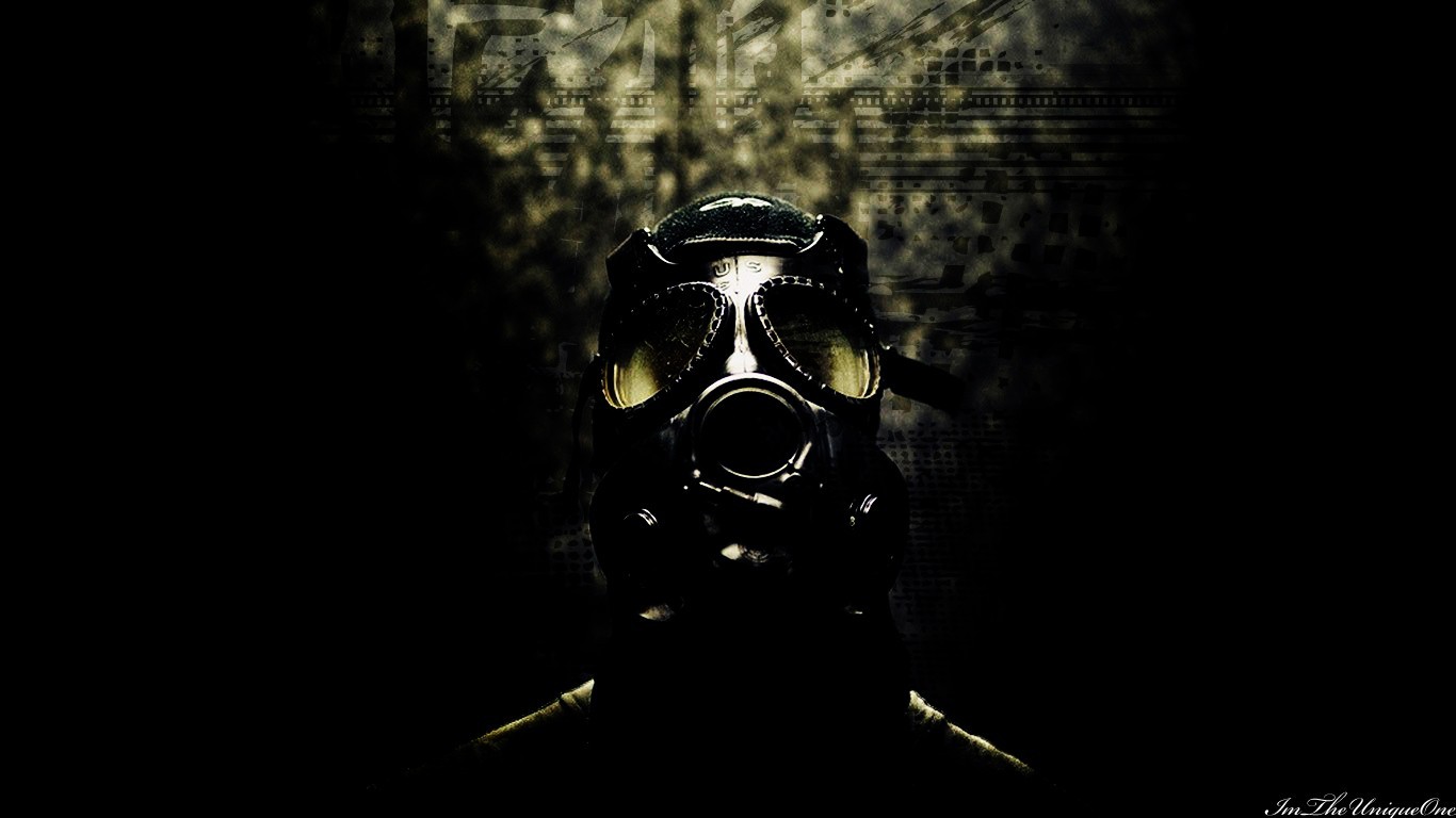 Person wearing a gas mask in dark environment HD Wallpaper
