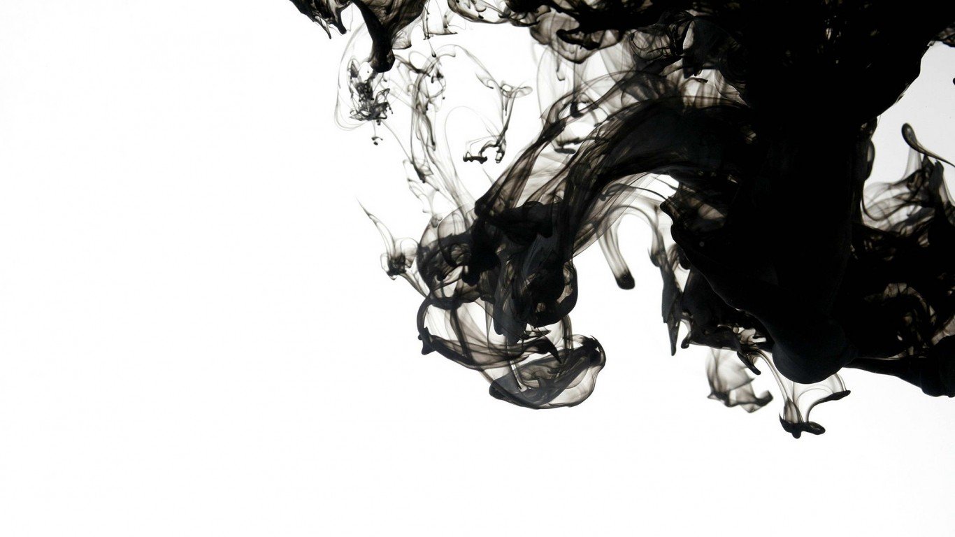 Black ink dissolving in water HD Wallpaper