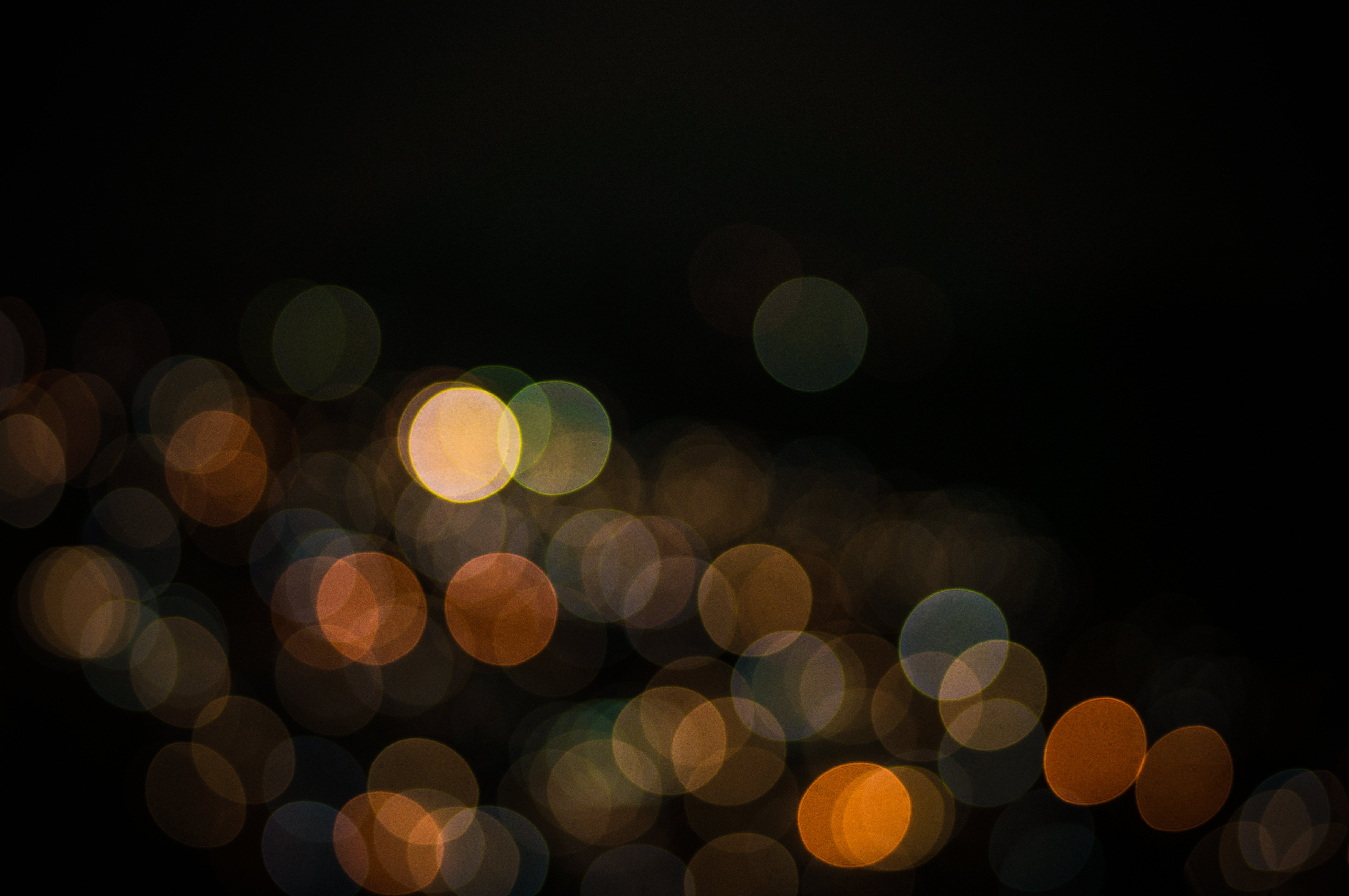 Bokeh lights on a dark background HD Wallpaper
