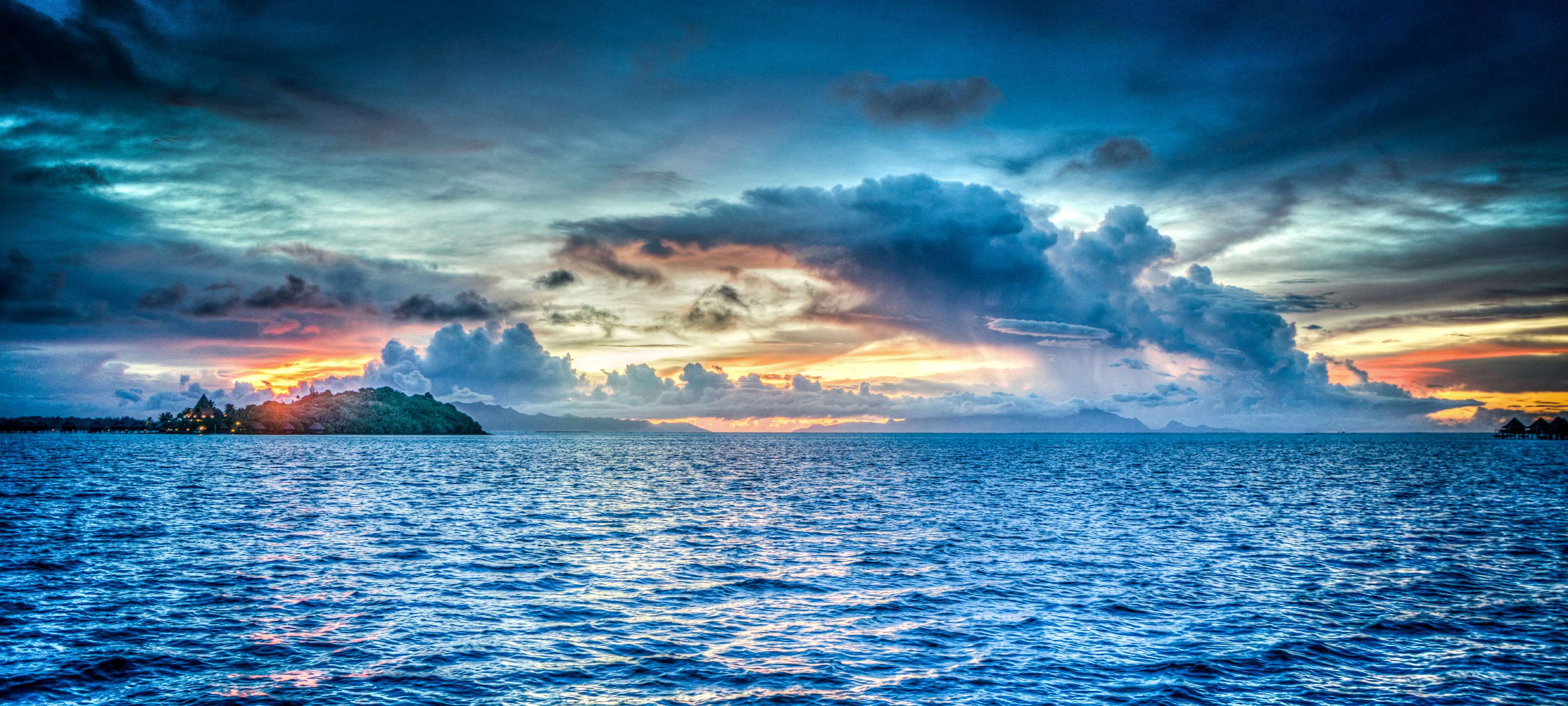 Tropical island sunset over the ocean 4K HD Wallpaper