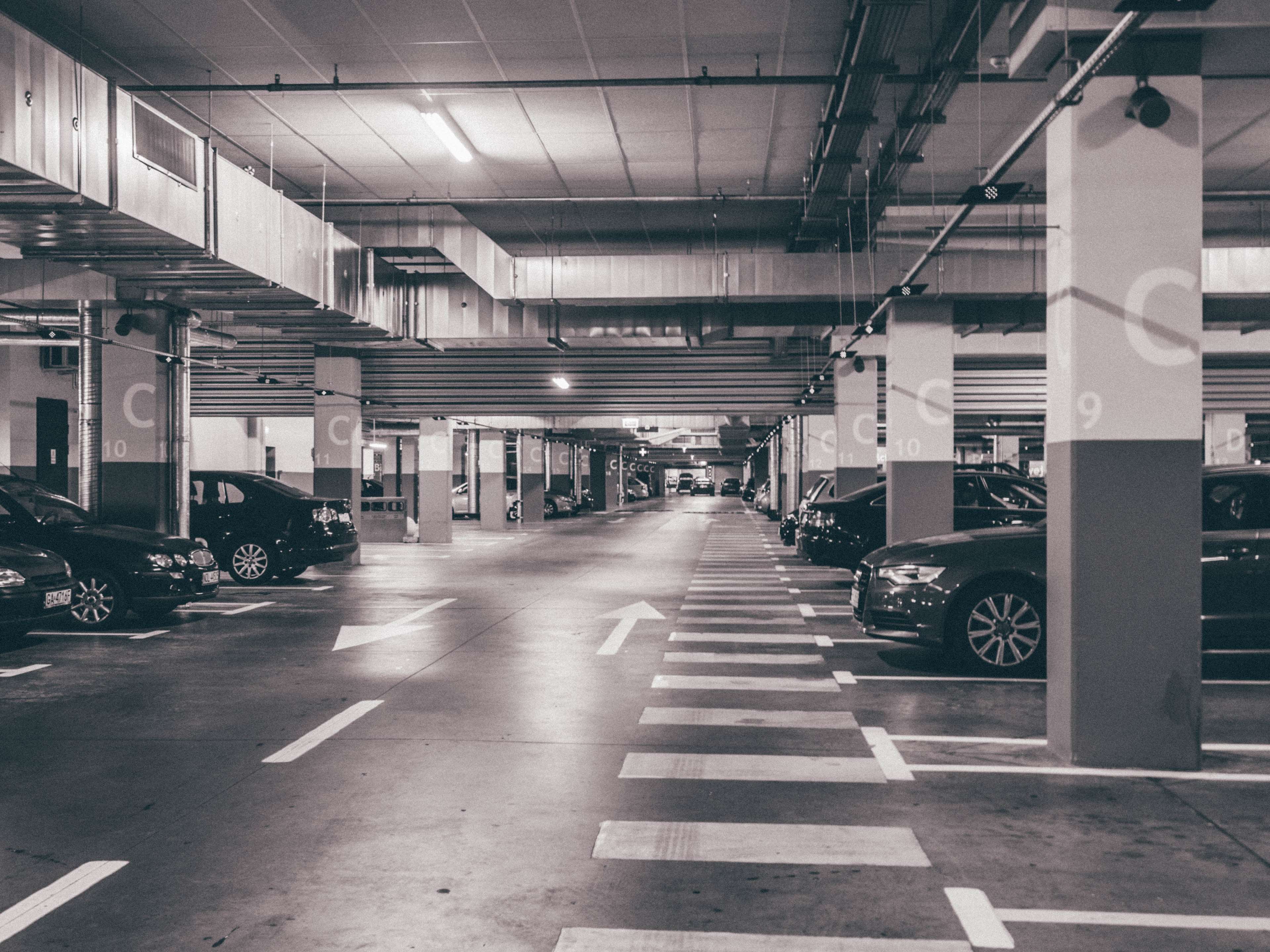 Cars in a parking area HD Wallpaper