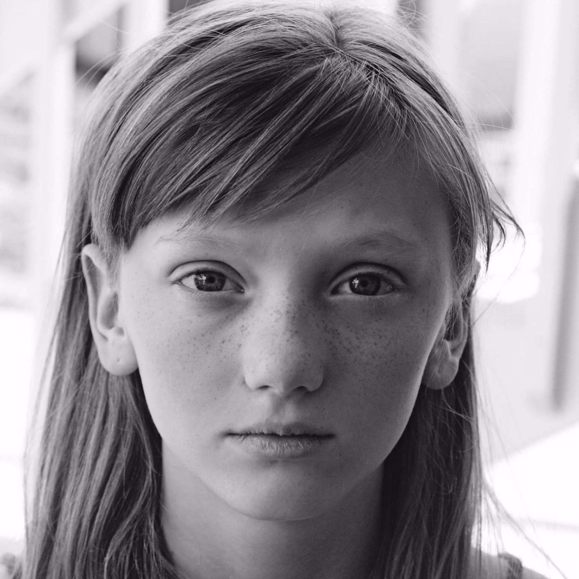 Portrait of a young girl with freckles HD Wallpaper