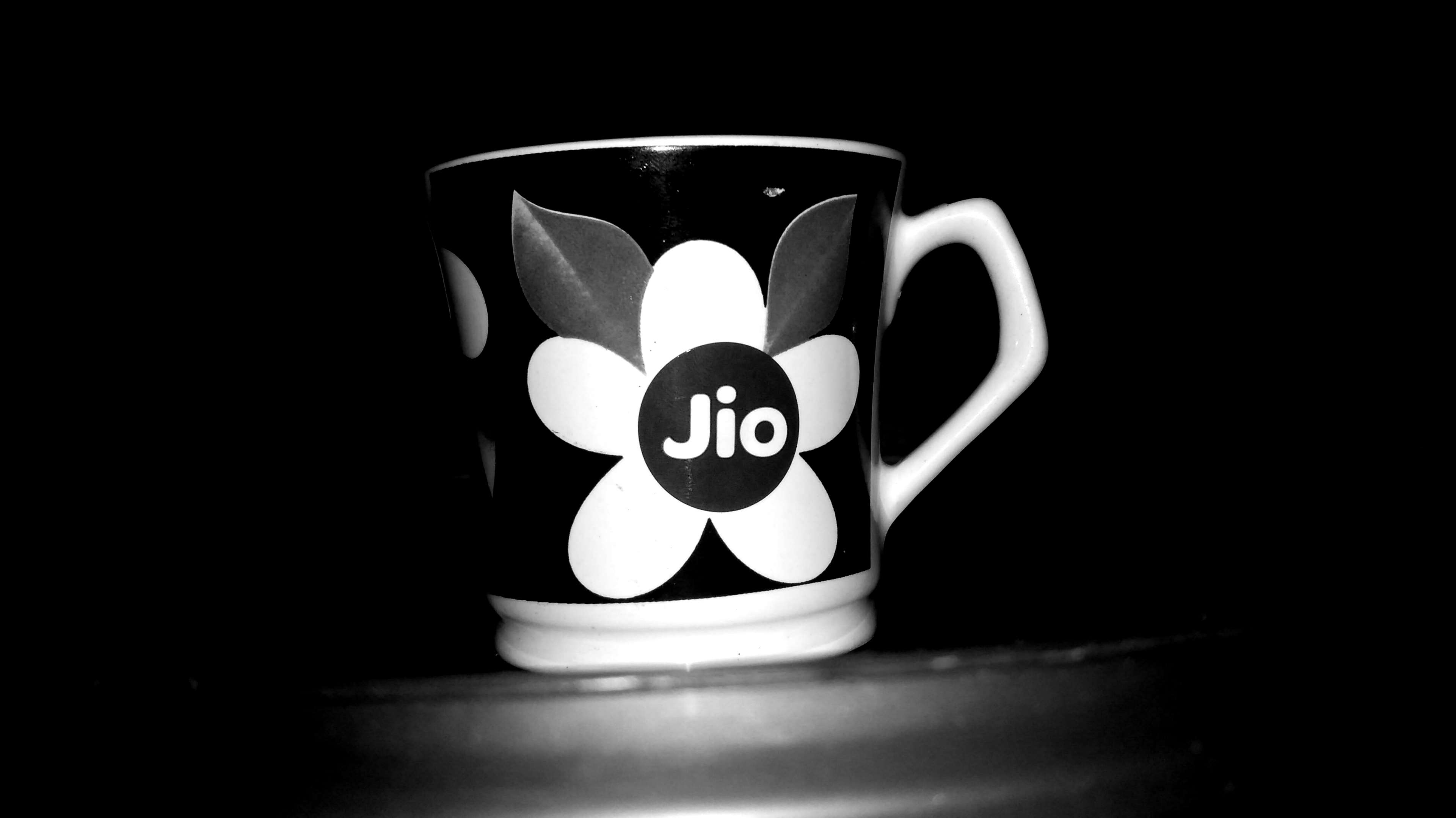 Black and white coffee cup with Jio logo HD Wallpaper