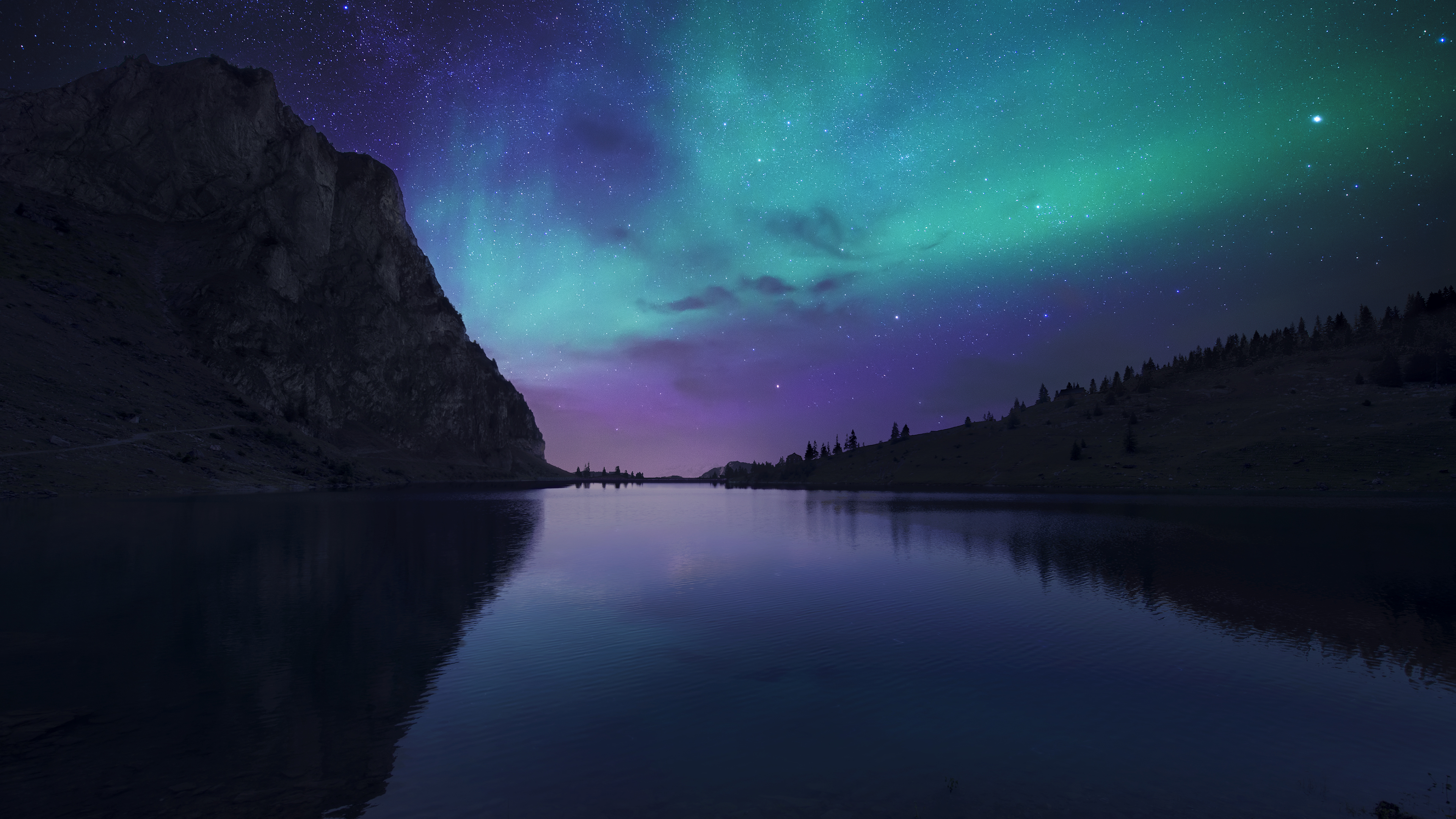 Aurora Borealis over a mountain lake in Switzerland HD Wallpaper