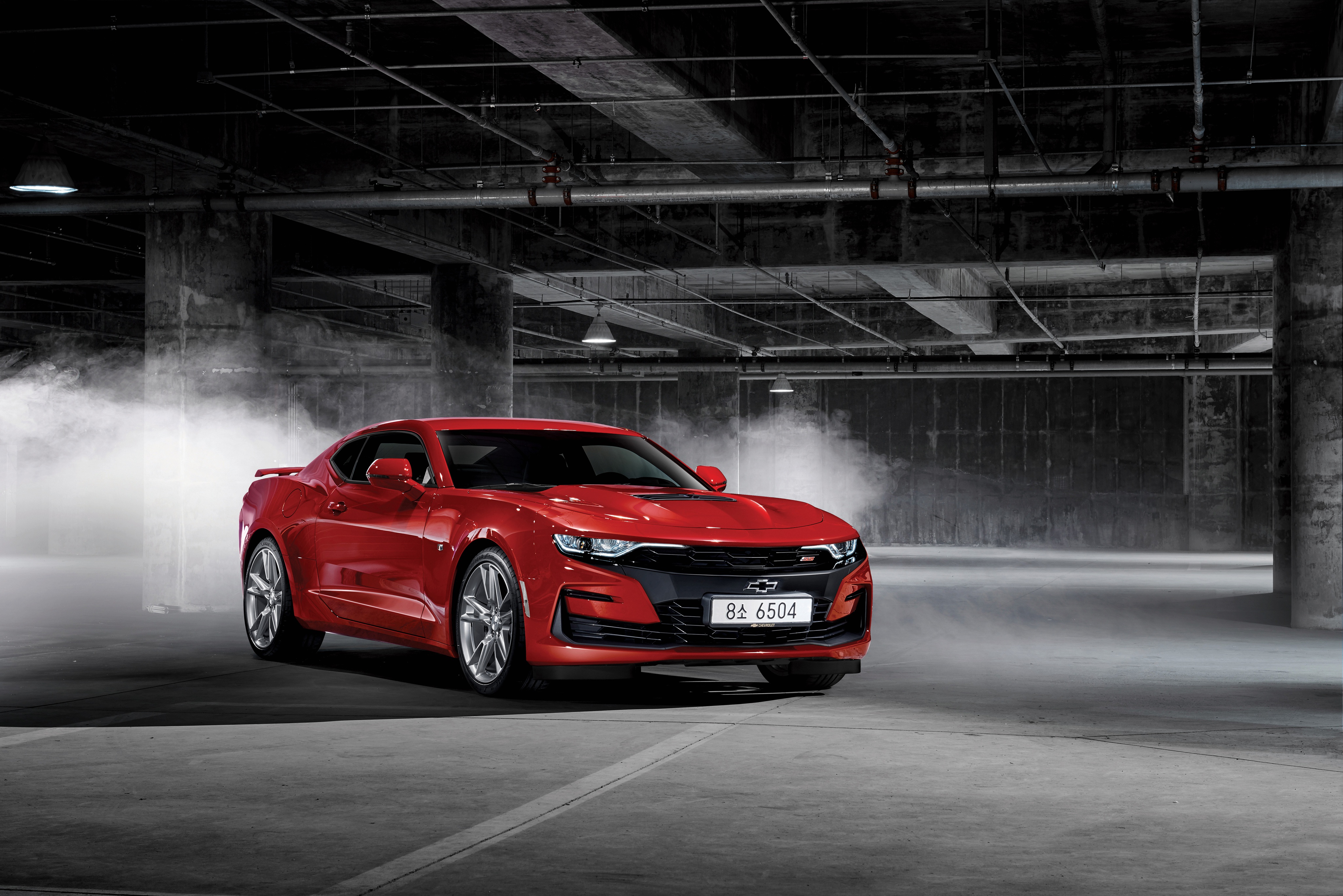 Red Chevrolet Camaro SS in a smoky garage HD Wallpaper