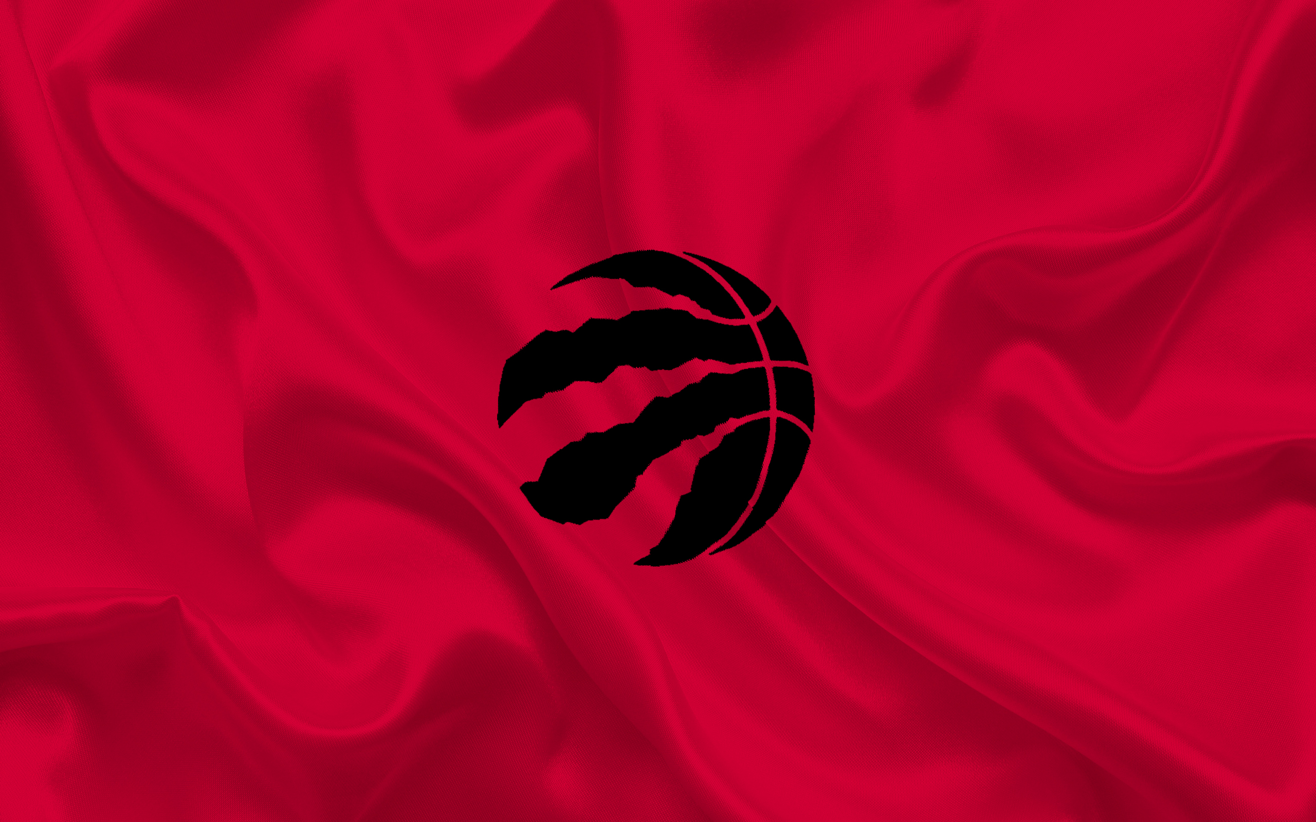 Toronto Raptors logo on red fabric HD Wallpaper