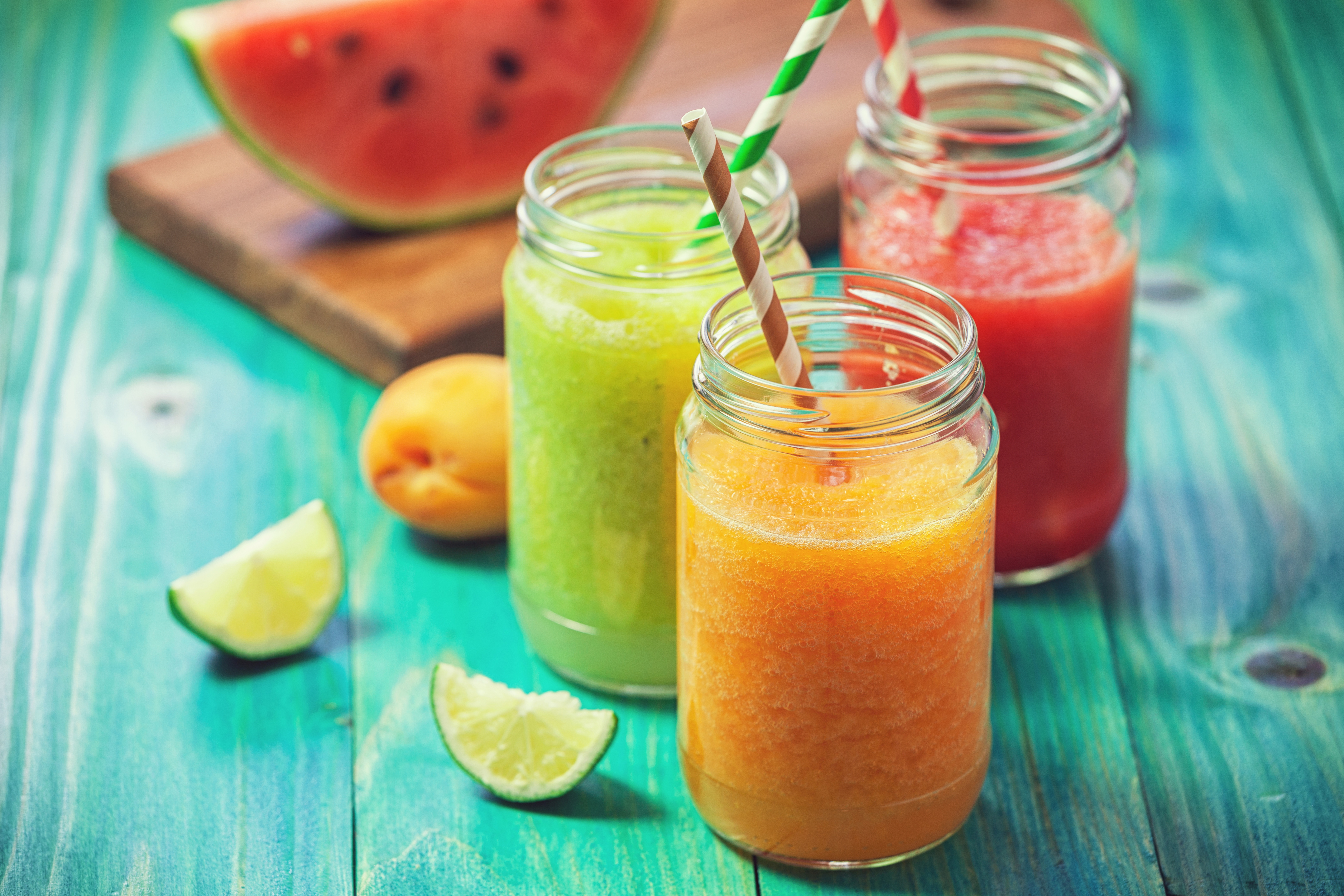 Three colorful fruit smoothies with watermelon and lime HD Wallpaper