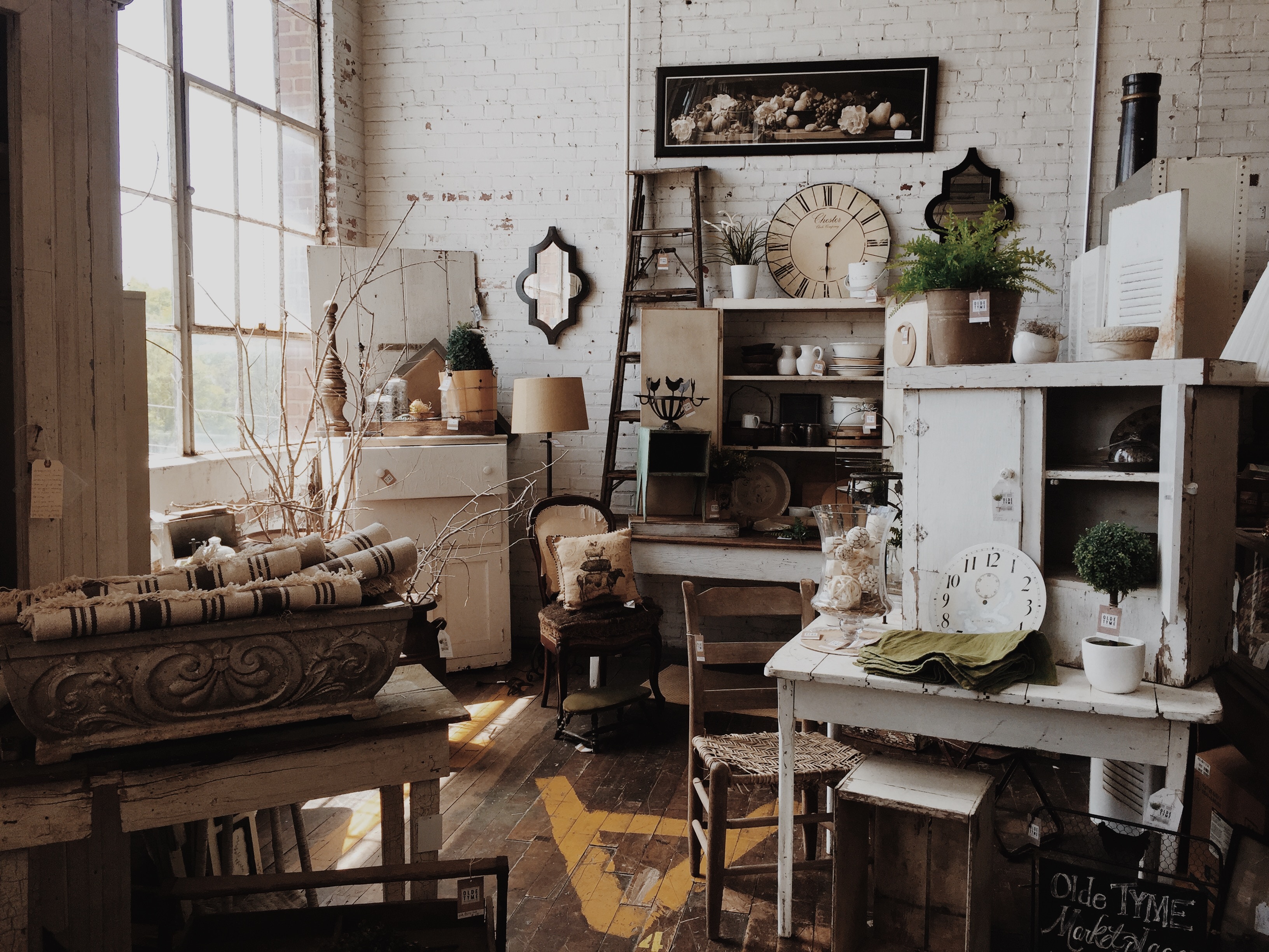 Vintage shop interior with antique furniture and decor HD Wallpaper