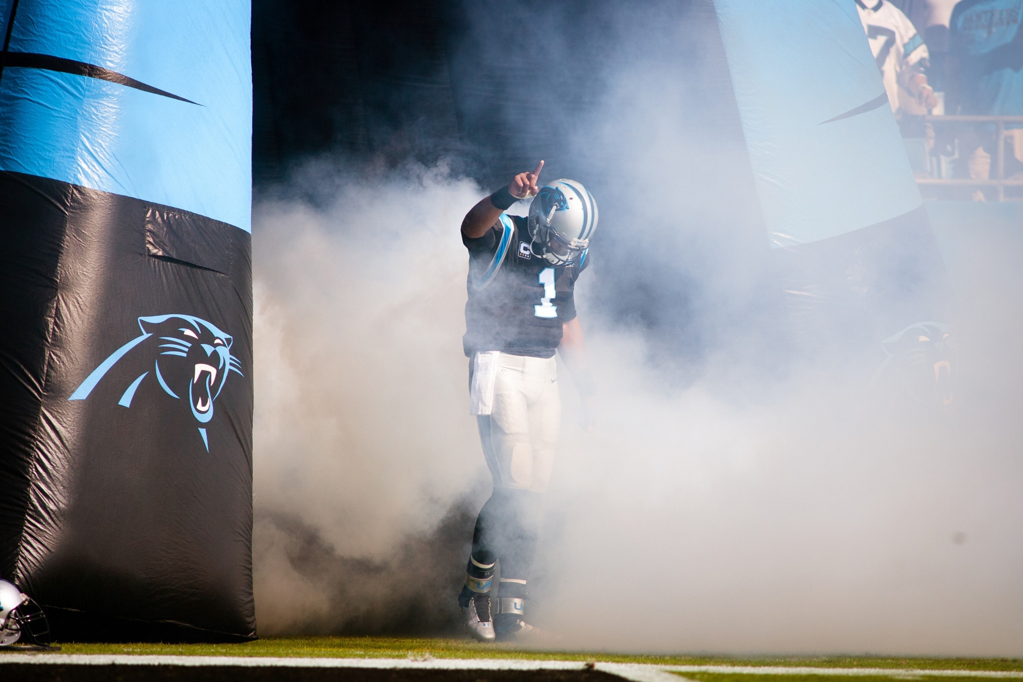 Cam Newton of the Carolina Panthers entering the field HD Wallpaper