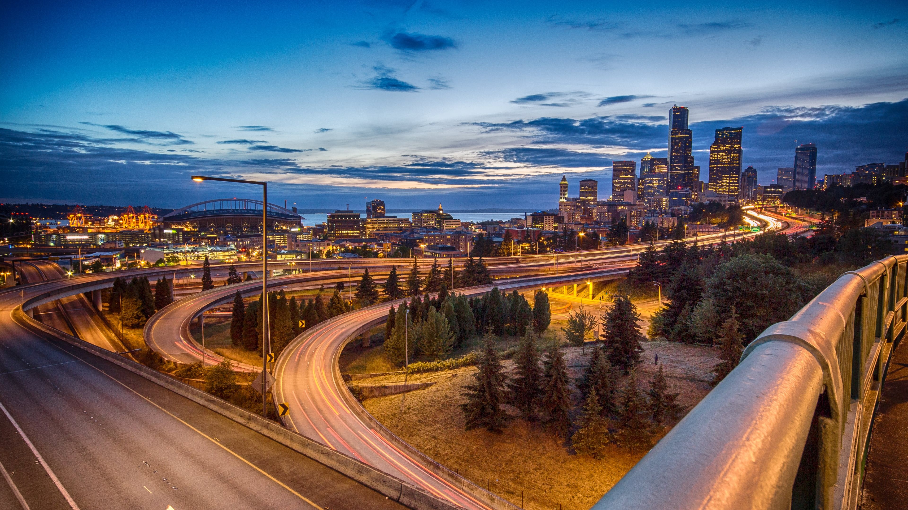 Seattle cityscape with highway at dusk HD Wallpaper
