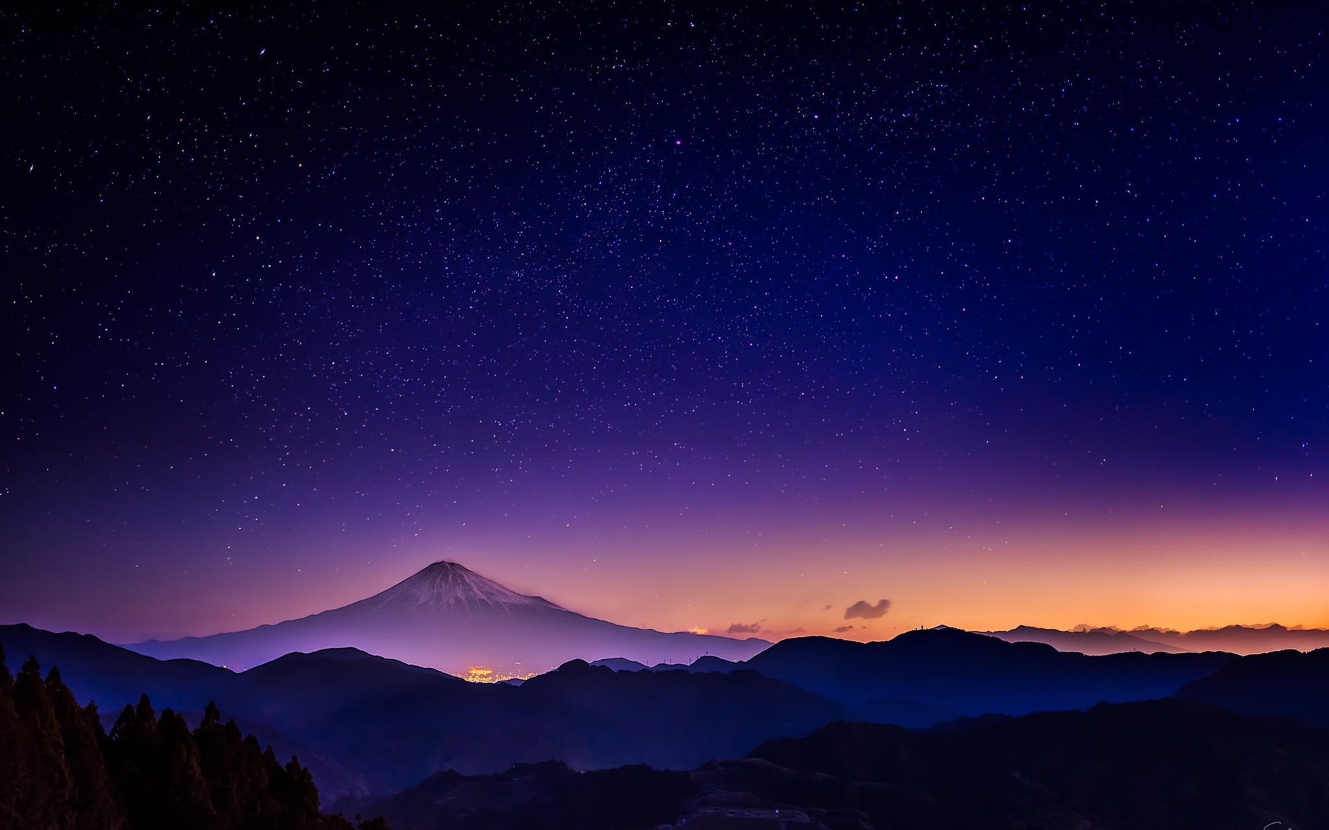 Mount Fuji under a starry night sky HD Wallpaper