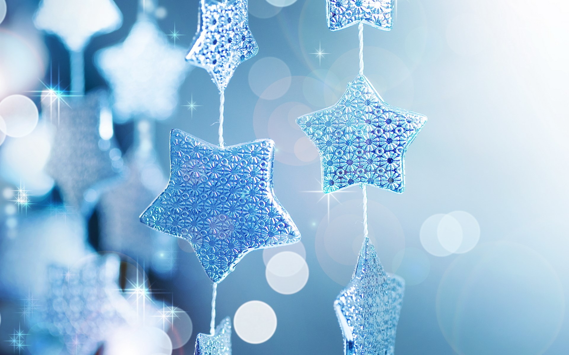 Blue star ornaments with bokeh lights HD Wallpaper