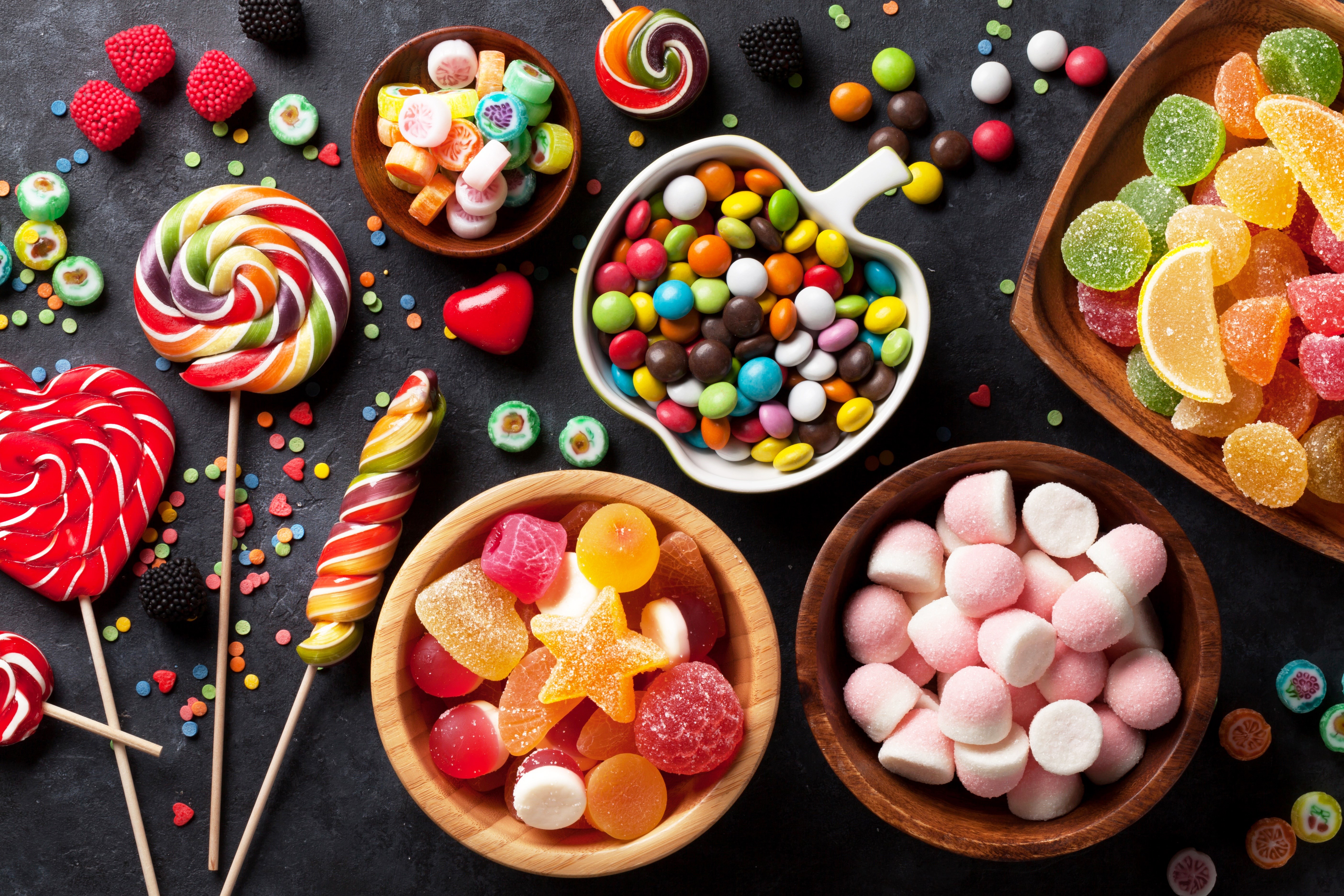 Colorful Mixed Candies and Lollipops in Bowls HD Wallpaper