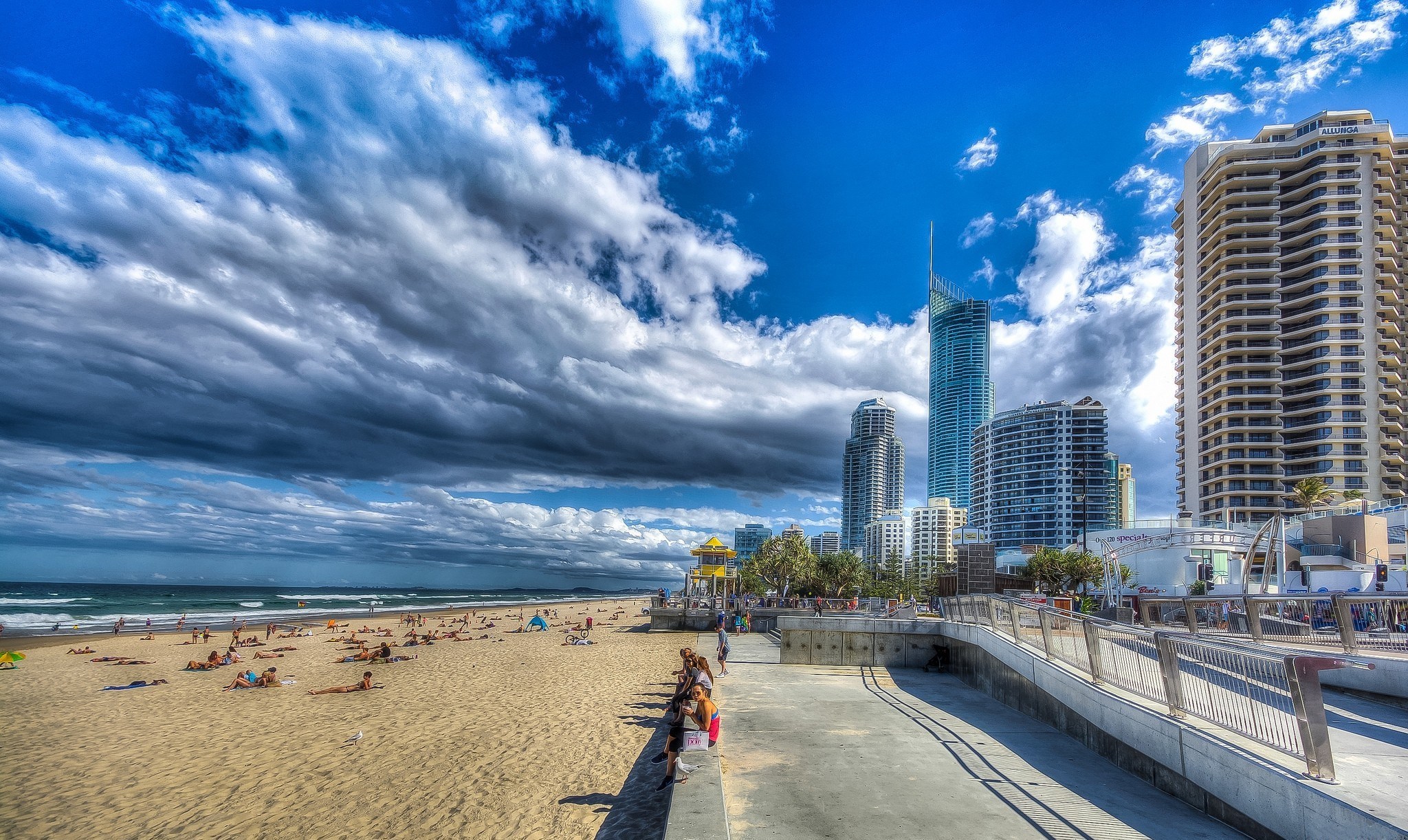 Gold Coast beach with high-rise buildings and cloudy sky HD Wallpaper
