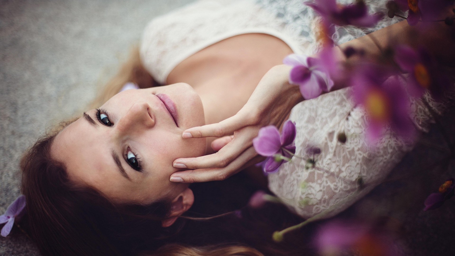Woman lying down with flowers HD Wallpaper