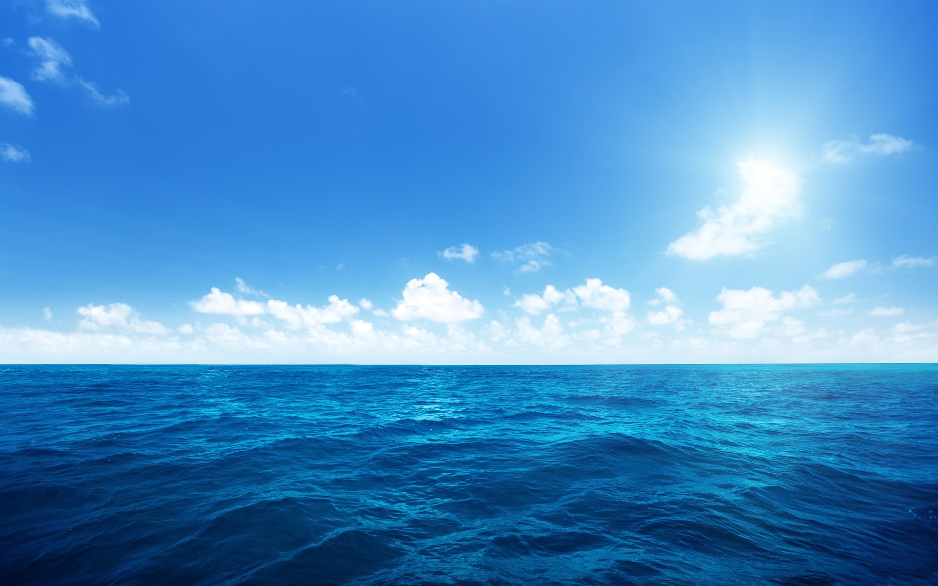 Ocean and Sky with Sun and Clouds HD Wallpaper