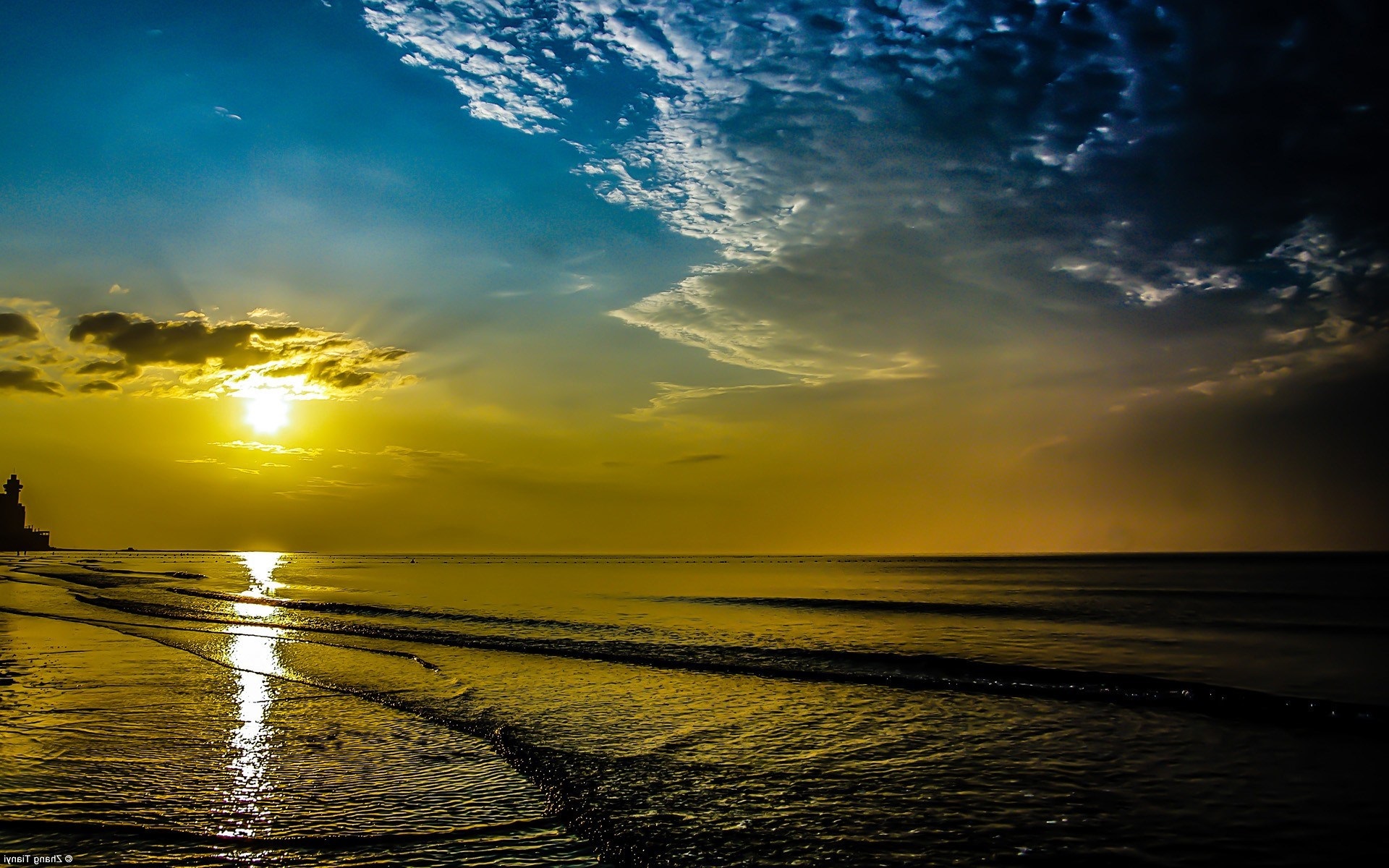 Sunrise over the ocean with dramatic clouds HD Wallpaper