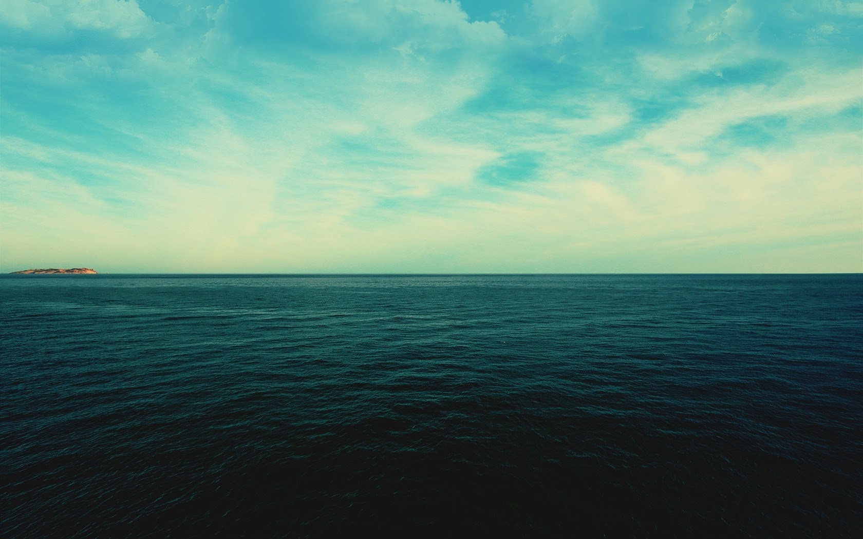 Ocean and Sky with Distant Island HD Wallpaper