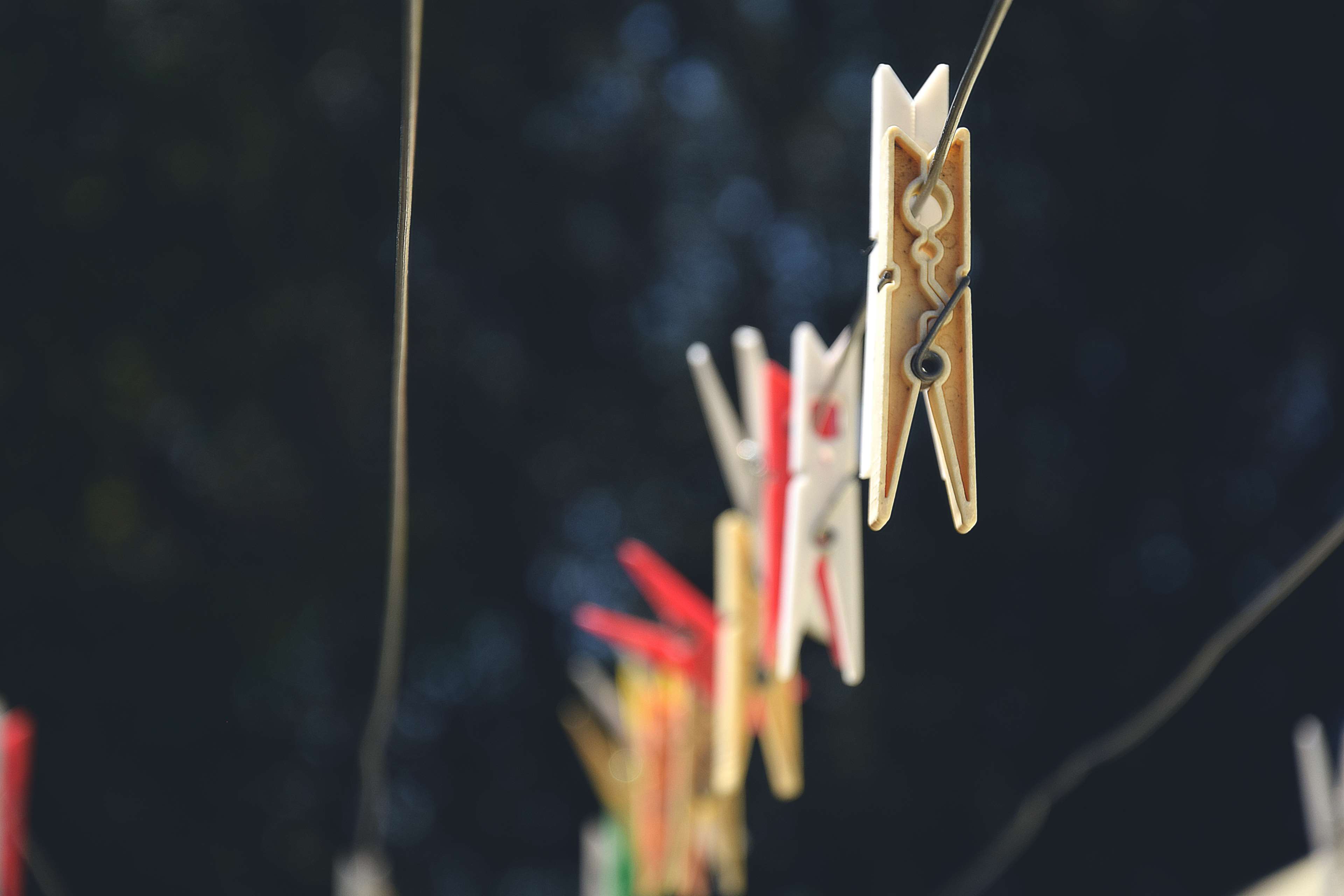Clothesline with clothespins outdoors HD Wallpaper