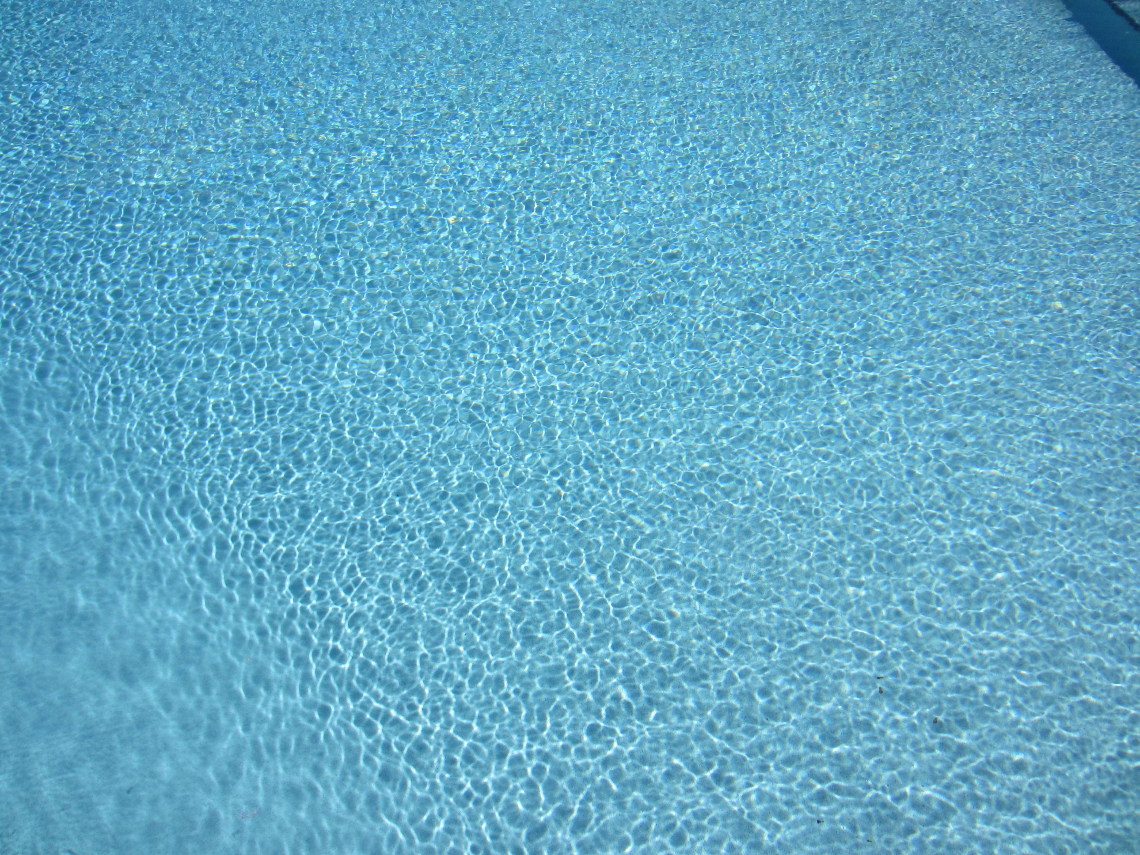 Blue swimming pool water with ripples 4K HD Wallpaper
