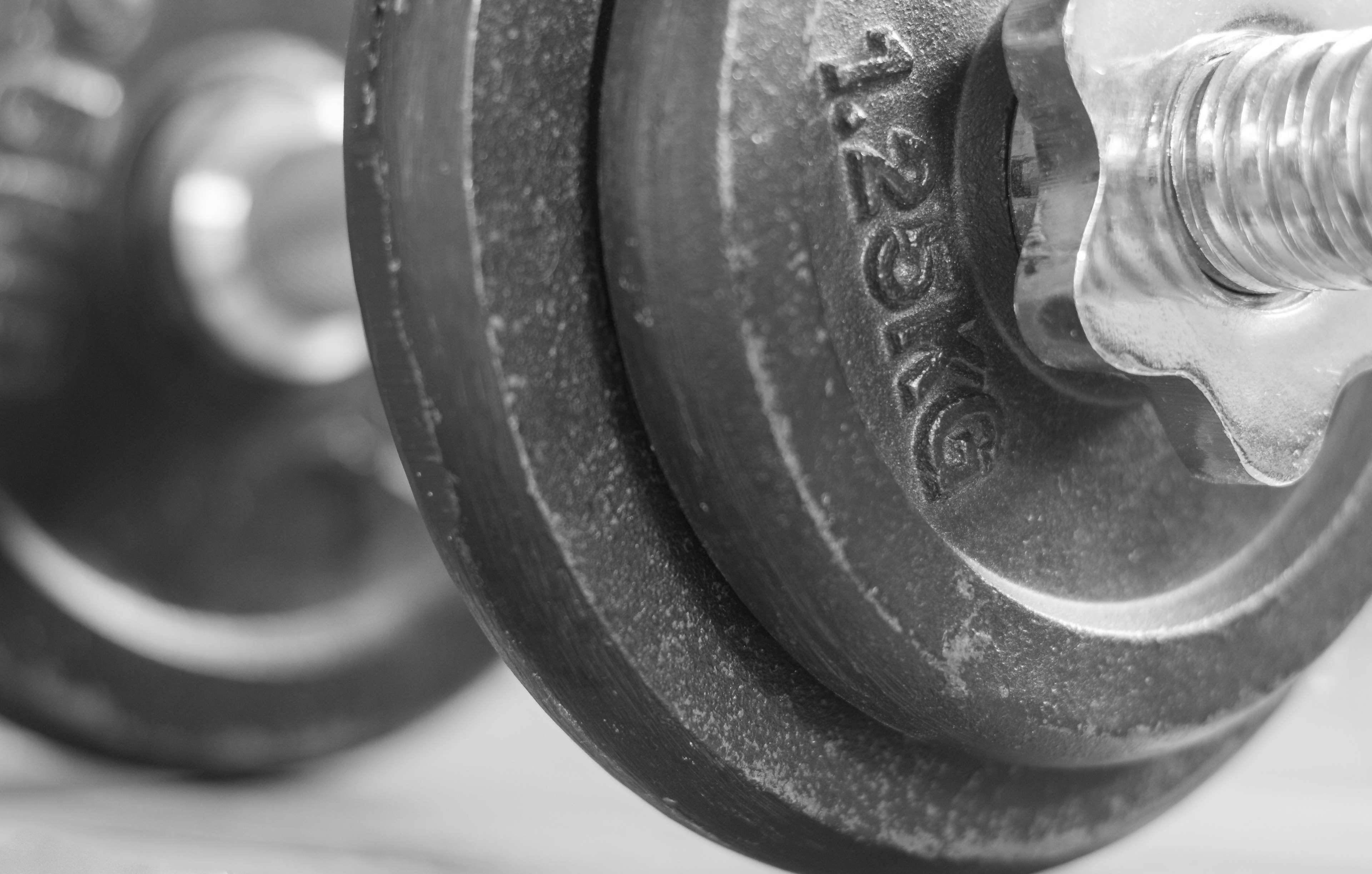 Close-up of a 1.25kg dumbbell weight HD Wallpaper
