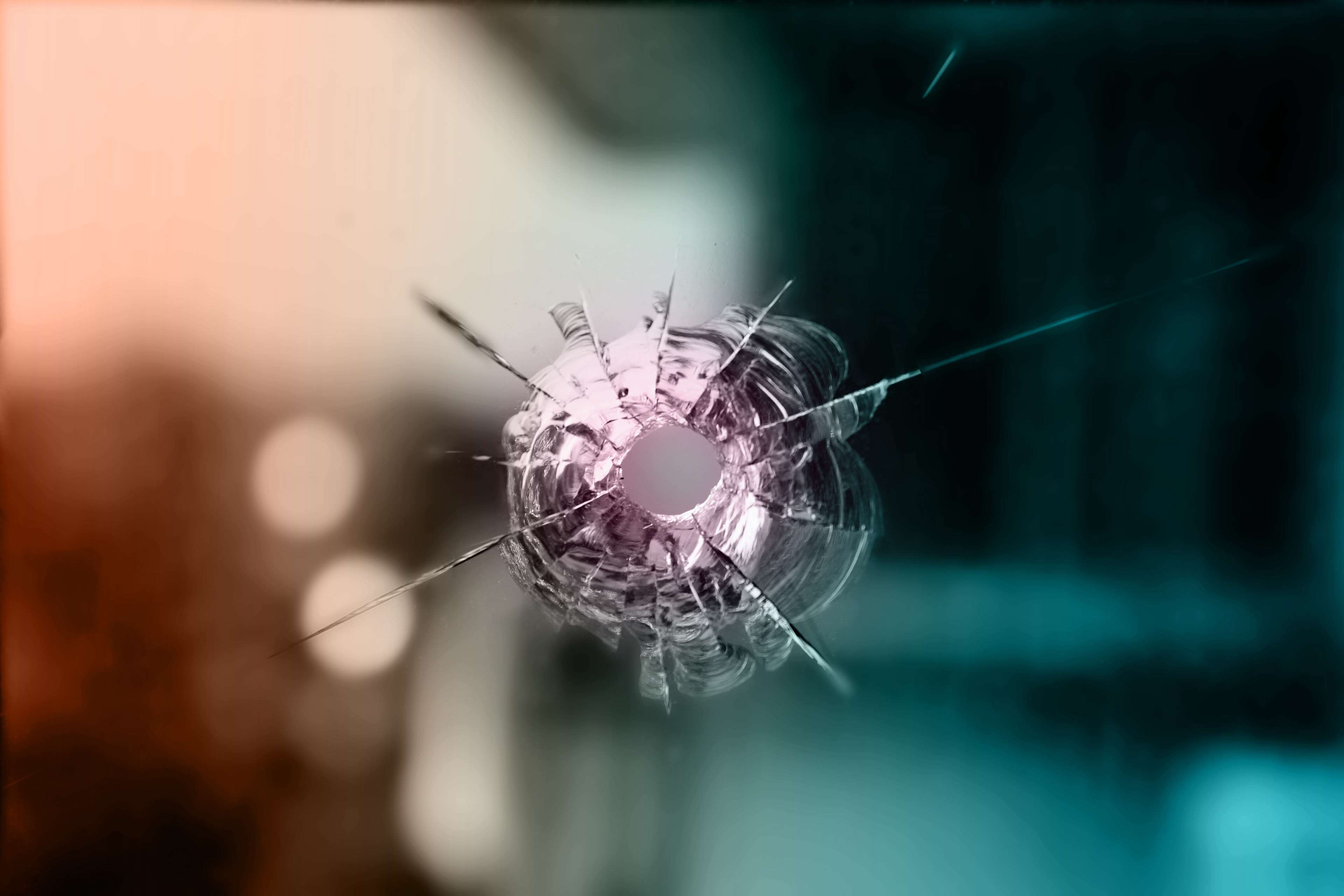 Bullet hole in glass 4K HD Wallpaper