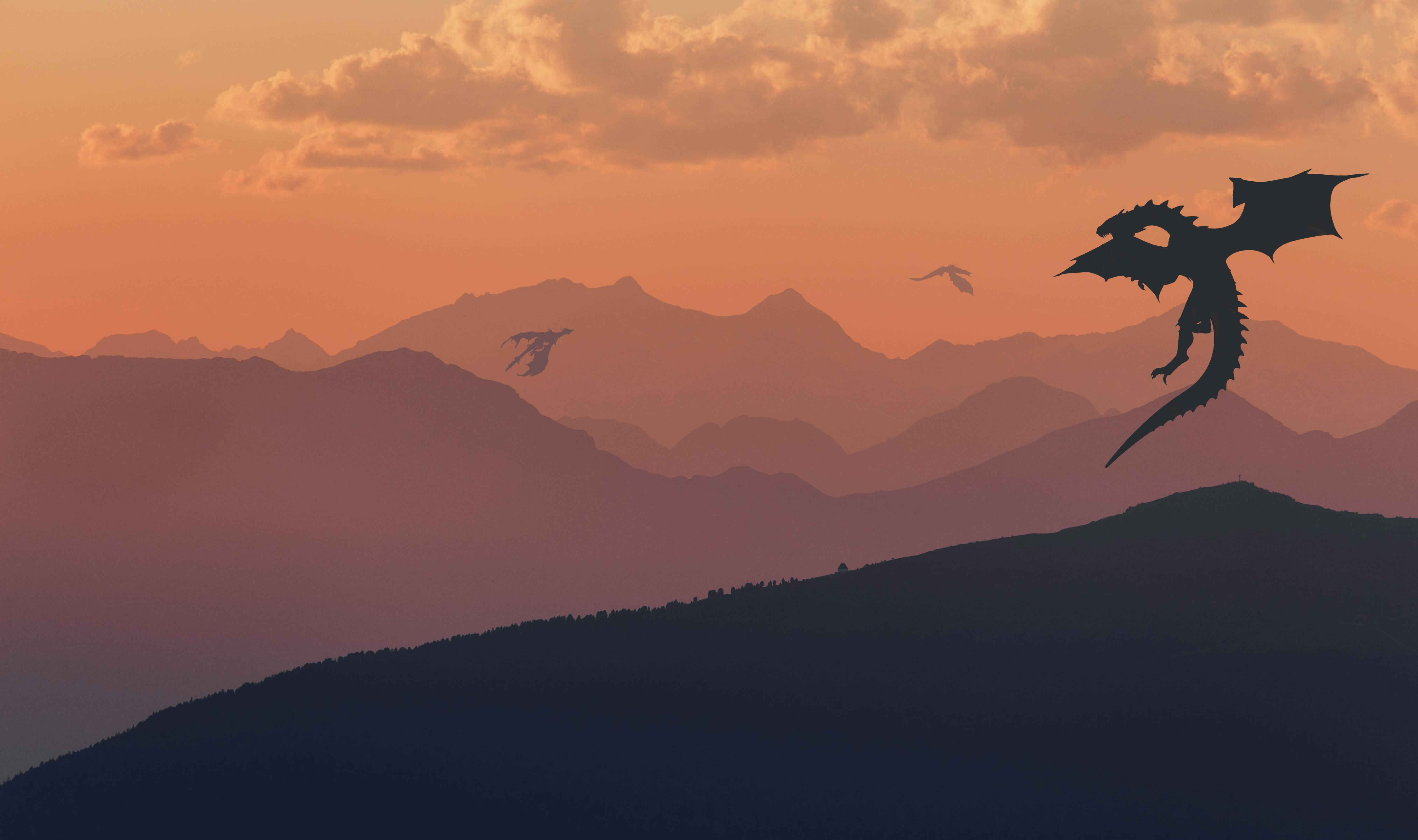 Dragons flying over mountains at sunset HD Wallpaper