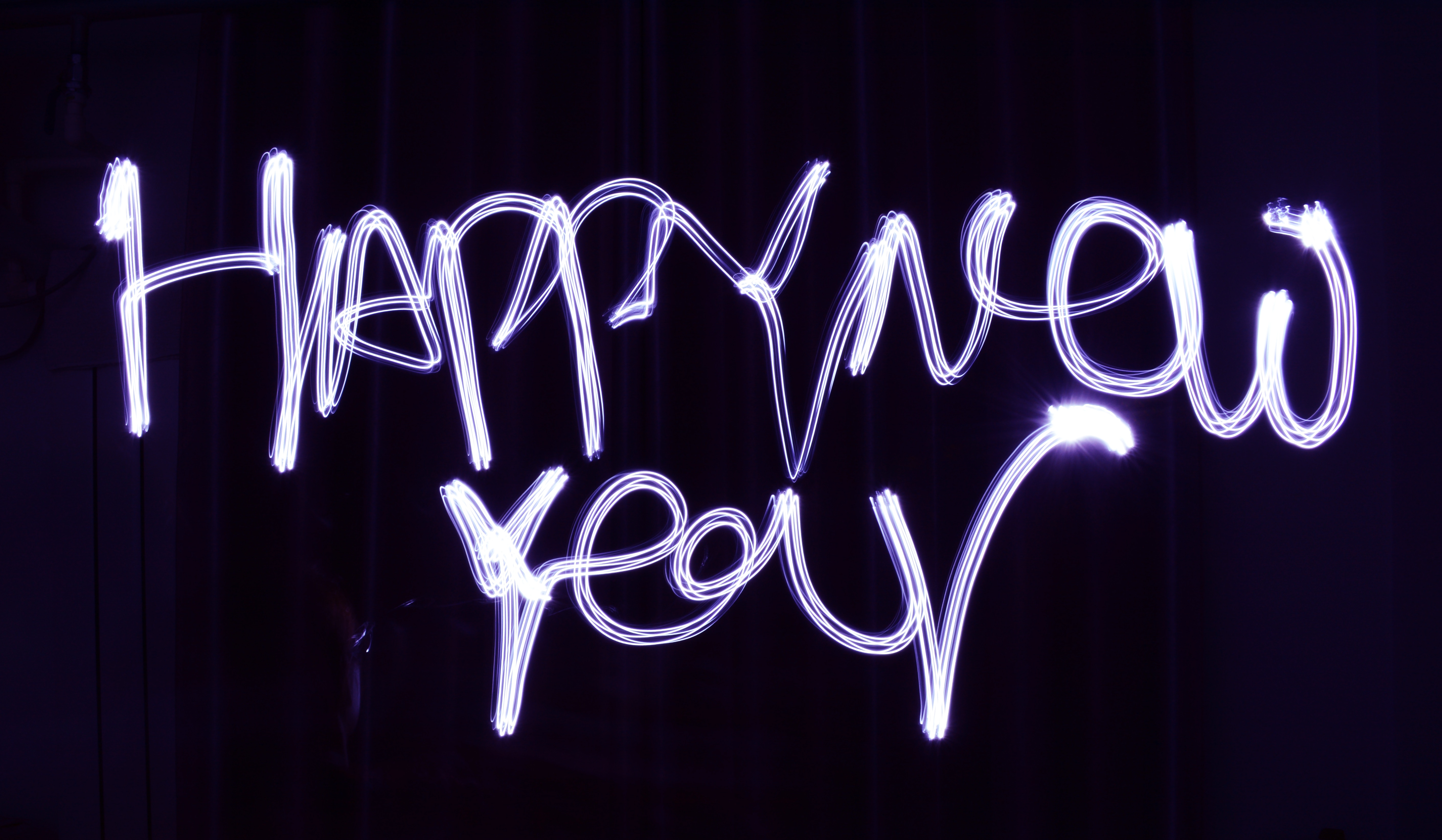 Happy New Year light painting HD Wallpaper