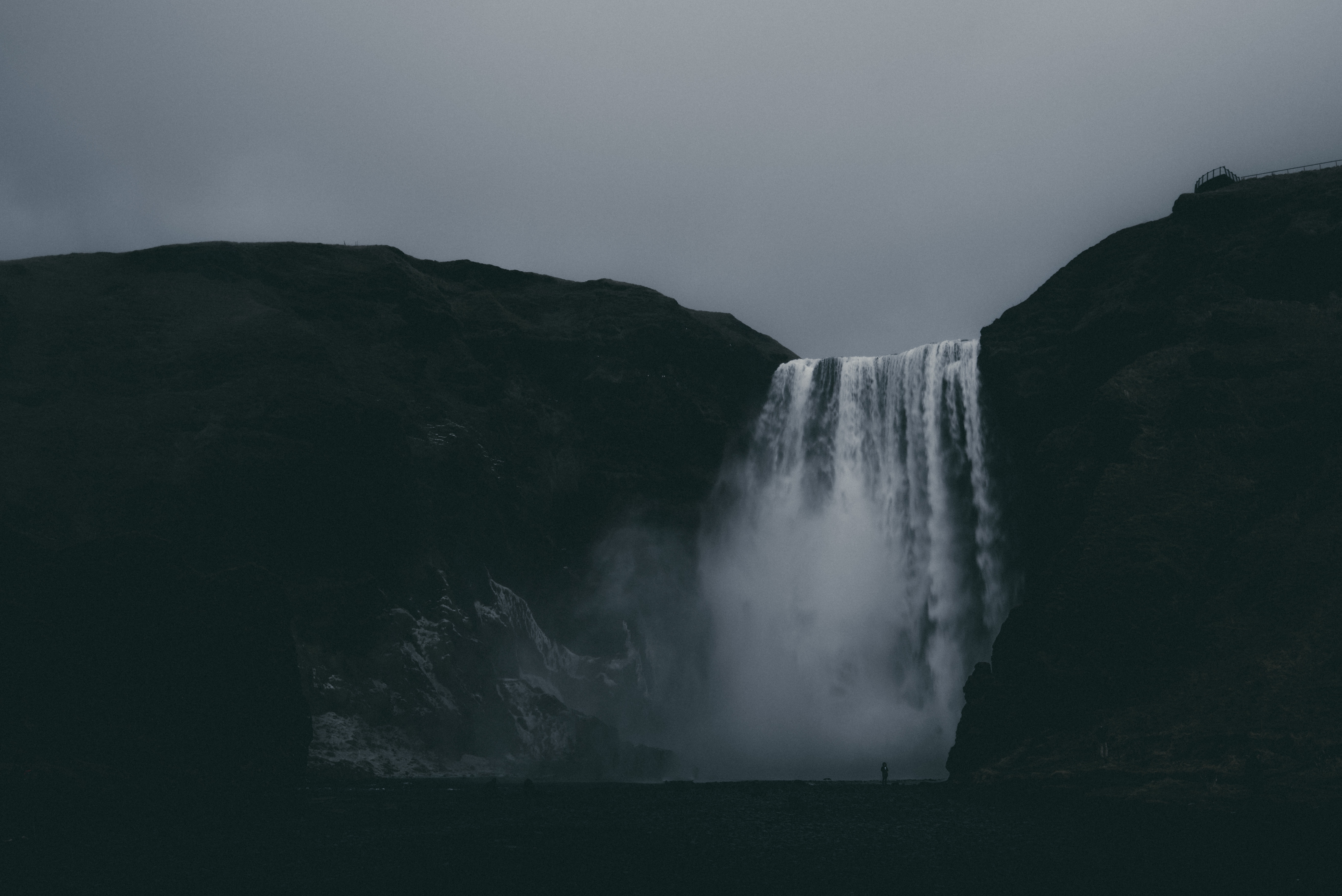 Skogafoss Waterfall in Iceland Under Overcast Skies HD Wallpaper