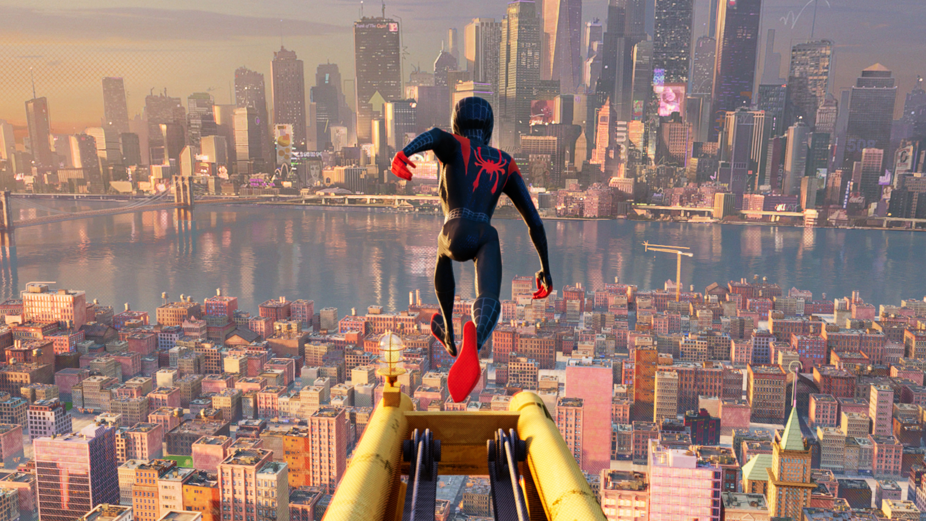 Spider-Man (Miles Morales) jumping over a city HD Wallpaper