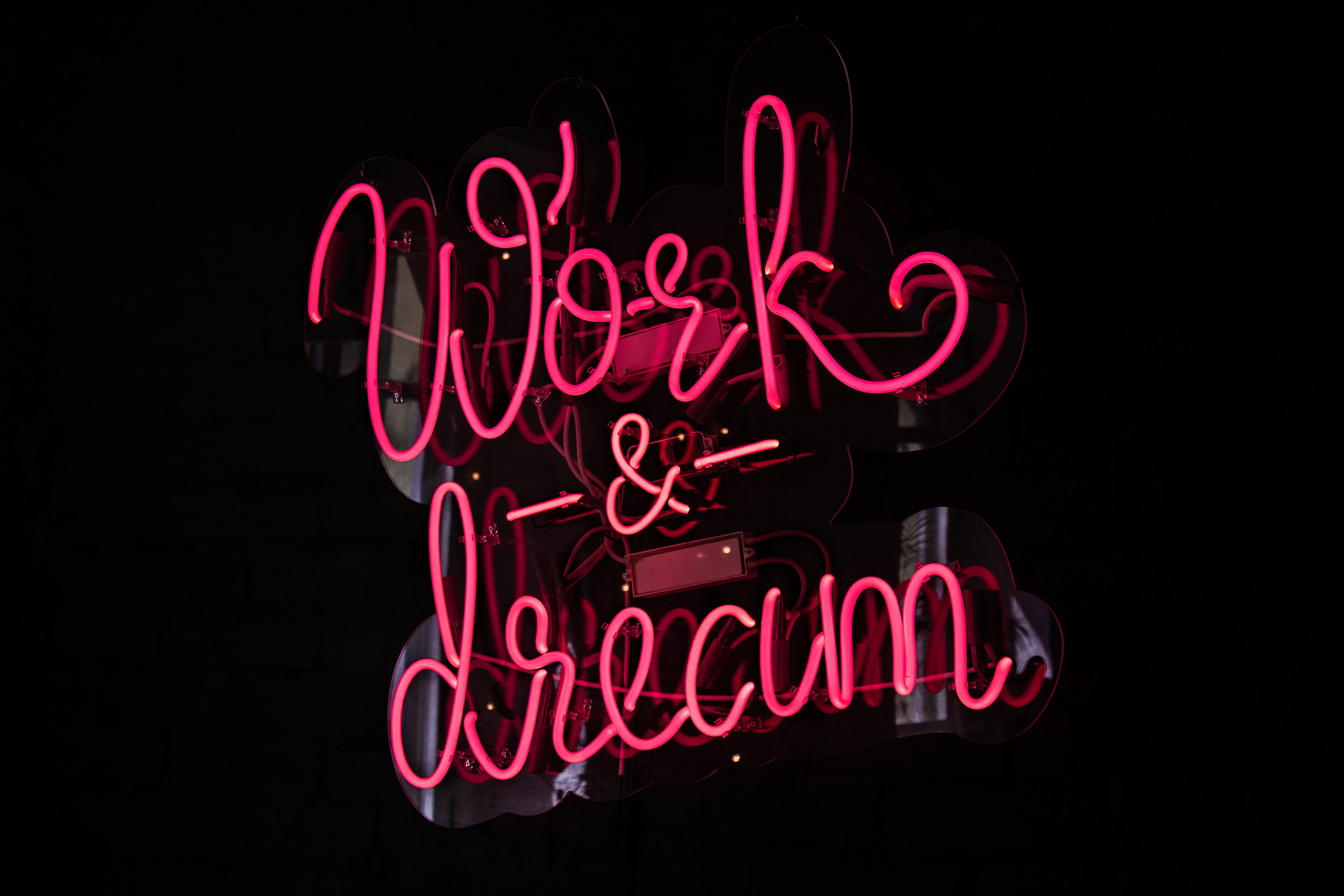 Pink neon sign that says "Work & Dream" HD Wallpaper