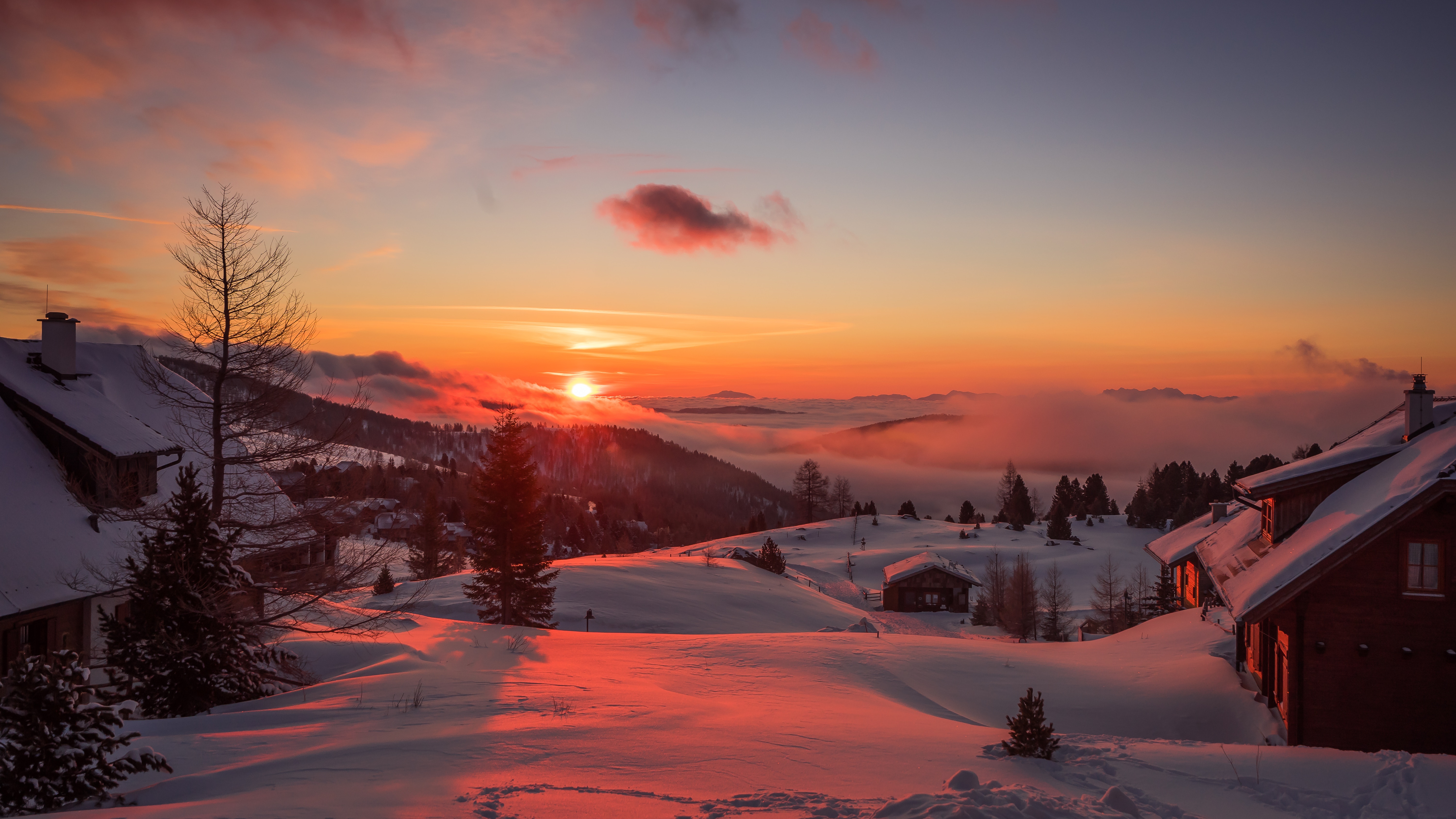 Winter sunrise over Austrian Alps with chalets HD Wallpaper