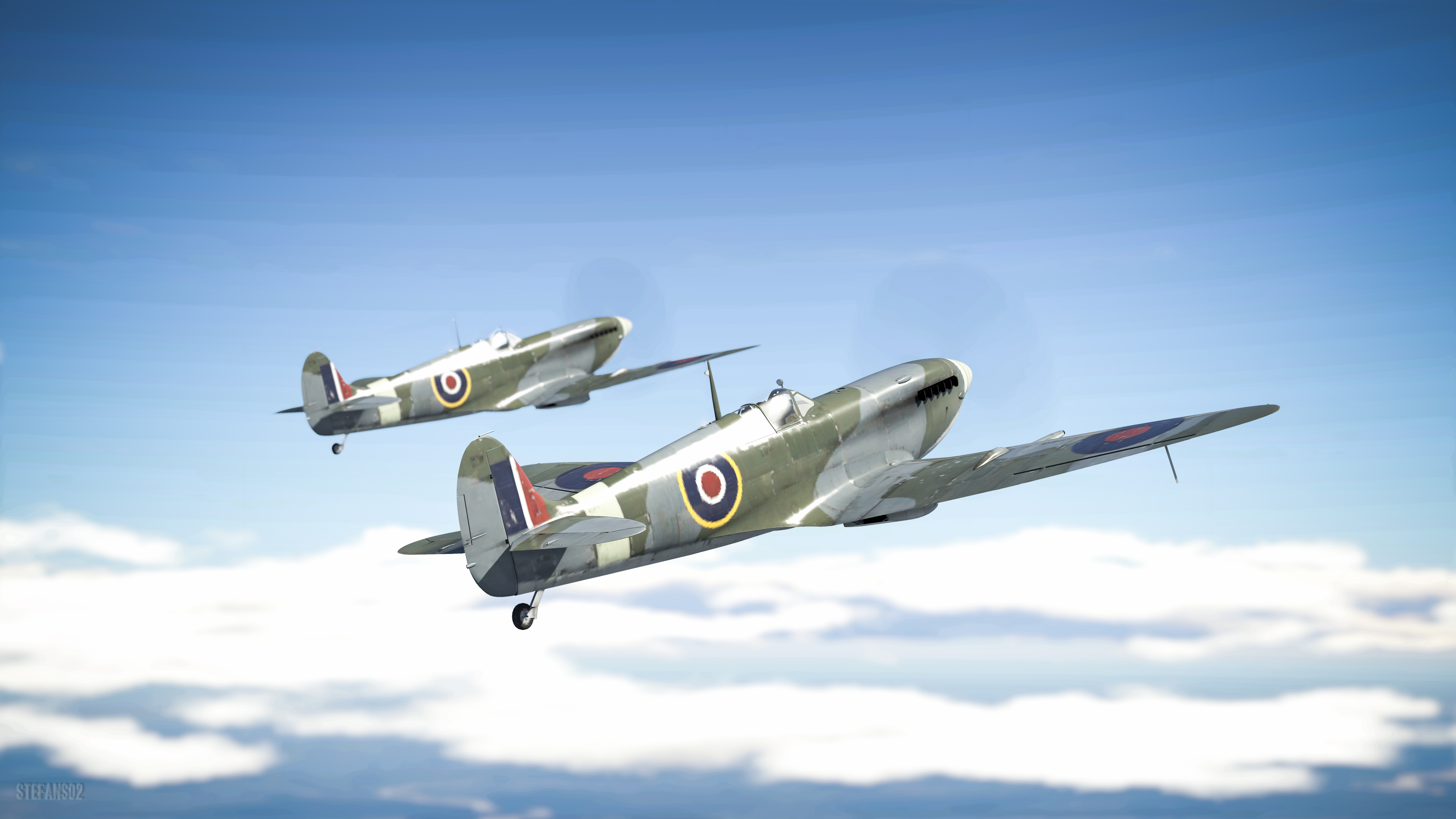 Two Supermarine Spitfires flying in formation HD Wallpaper