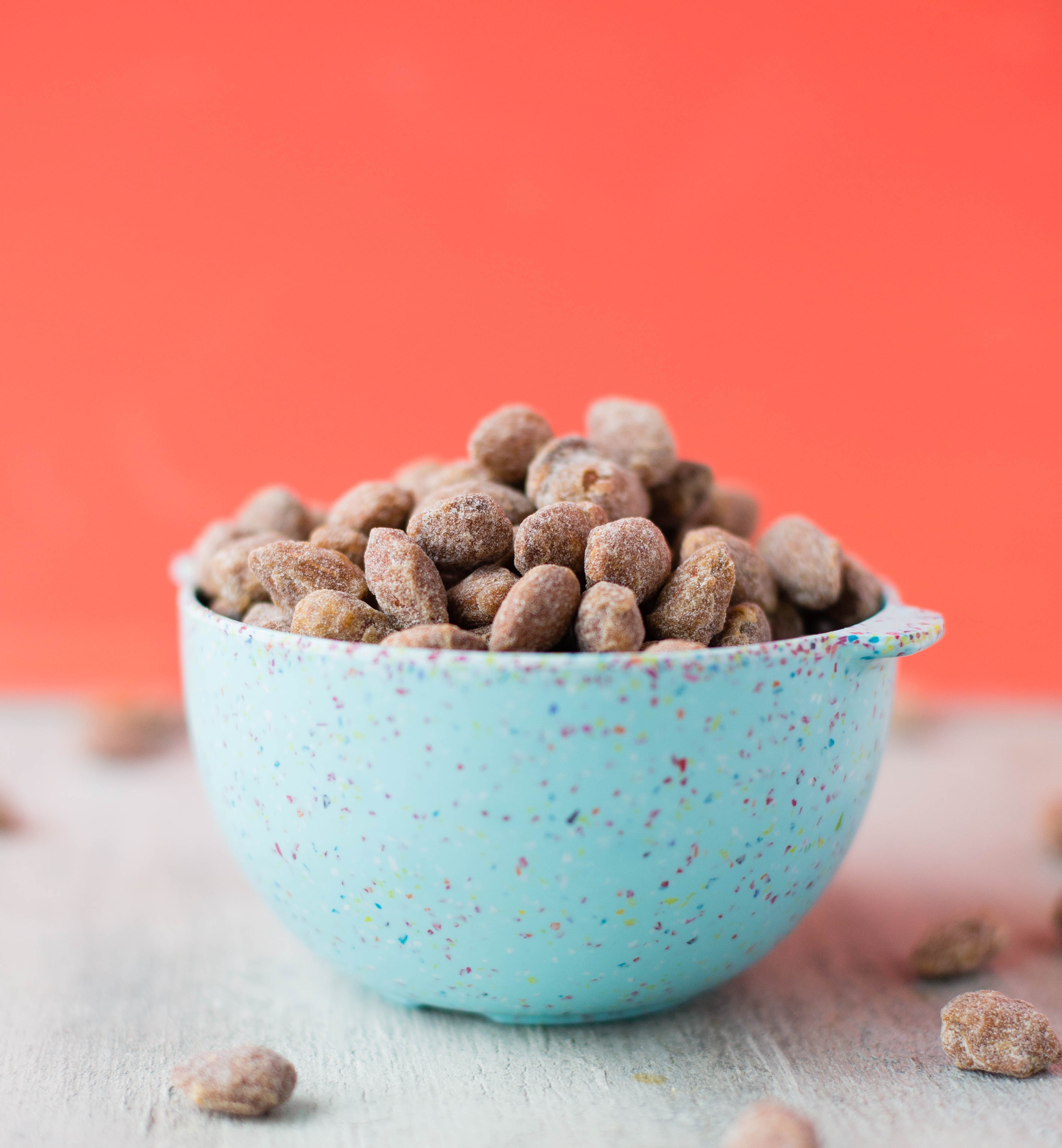 Almonds in a speckled blue bowl HD Wallpaper