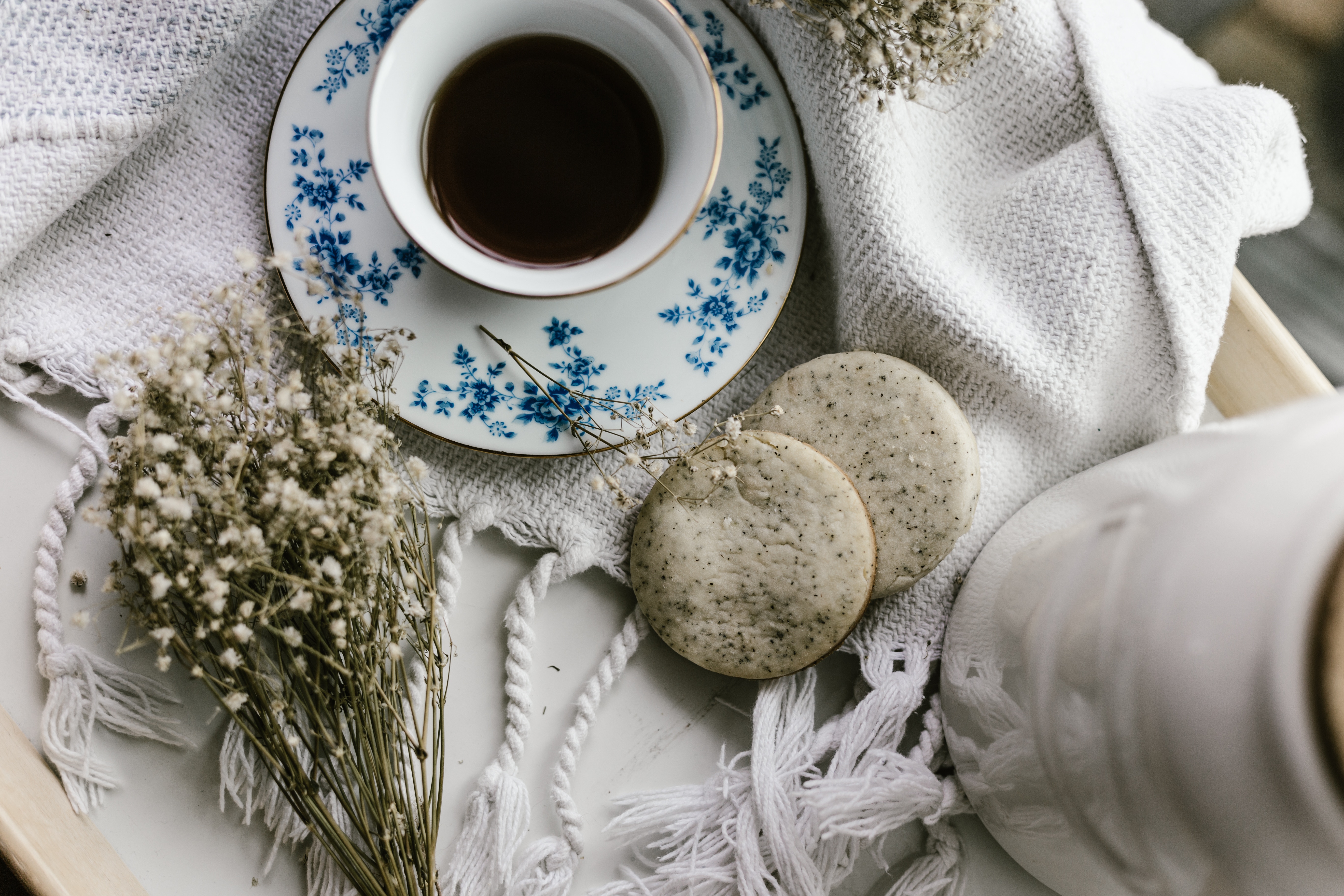 Tea and cookies on a tray with flowers HD Wallpaper