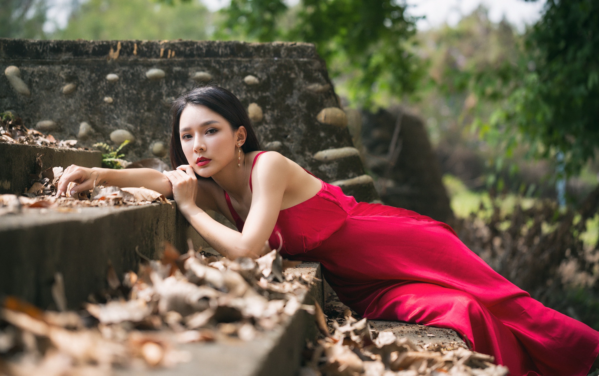 Elegant Asian Woman in Red Dress Outdoors HD Wallpaper