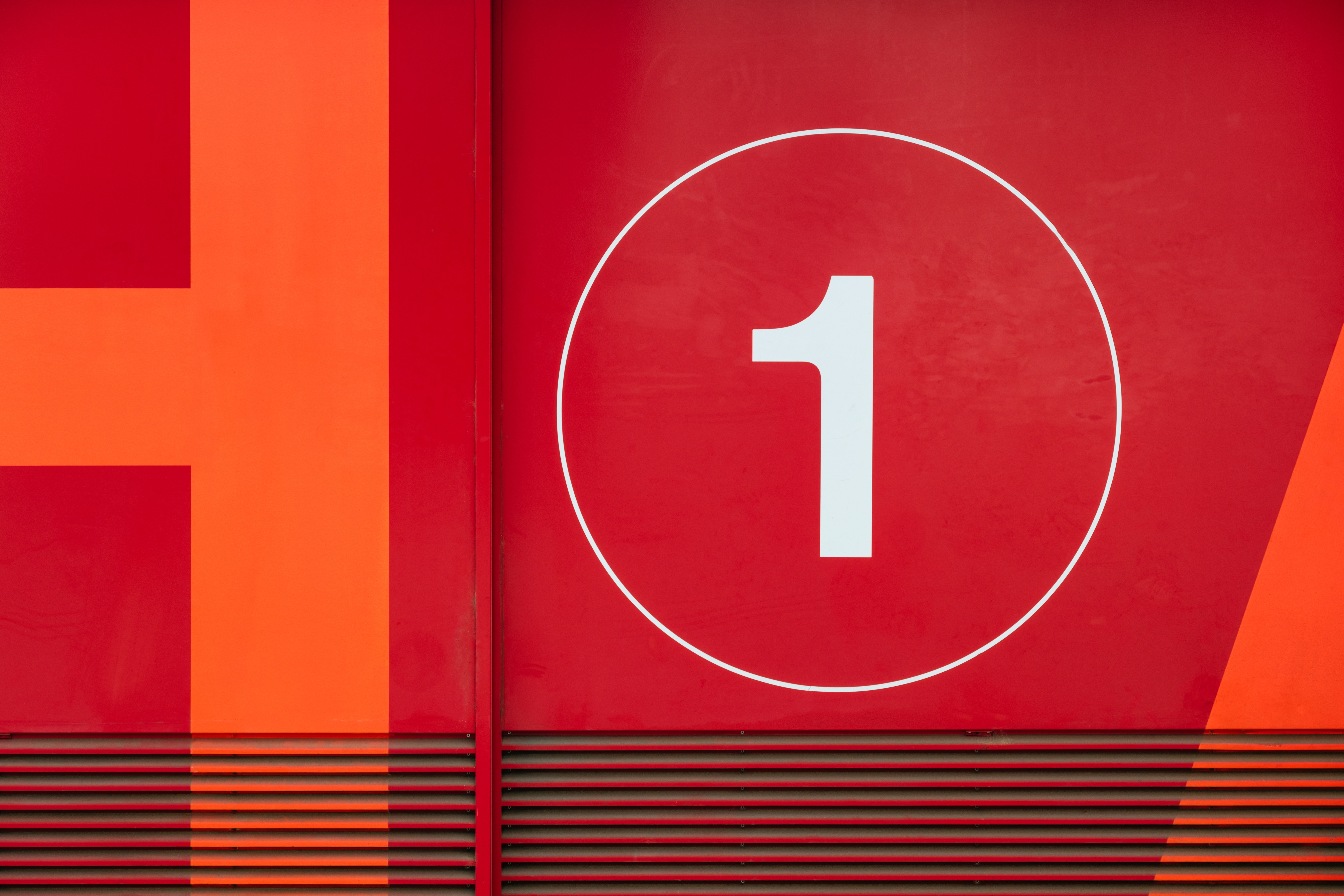Modern building facade with number 1 sign HD Wallpaper