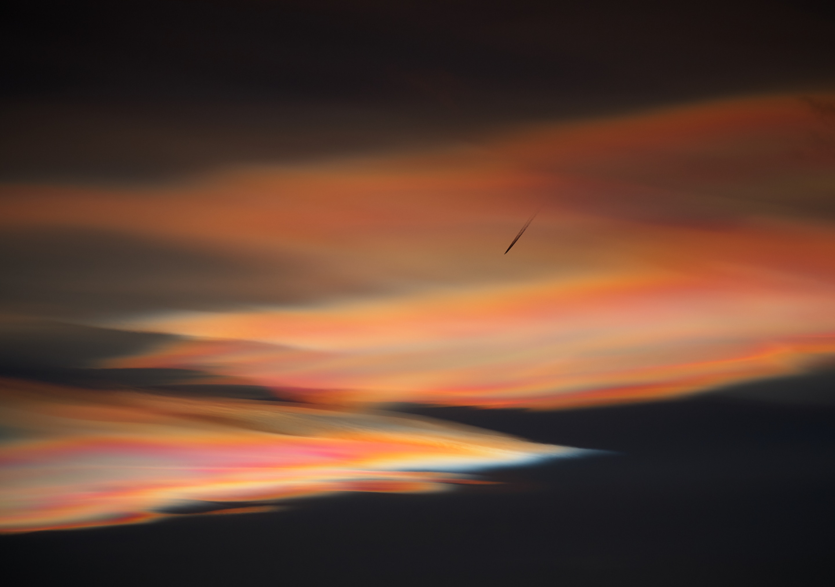 Polar stratospheric clouds with airplane trail HD Wallpaper
