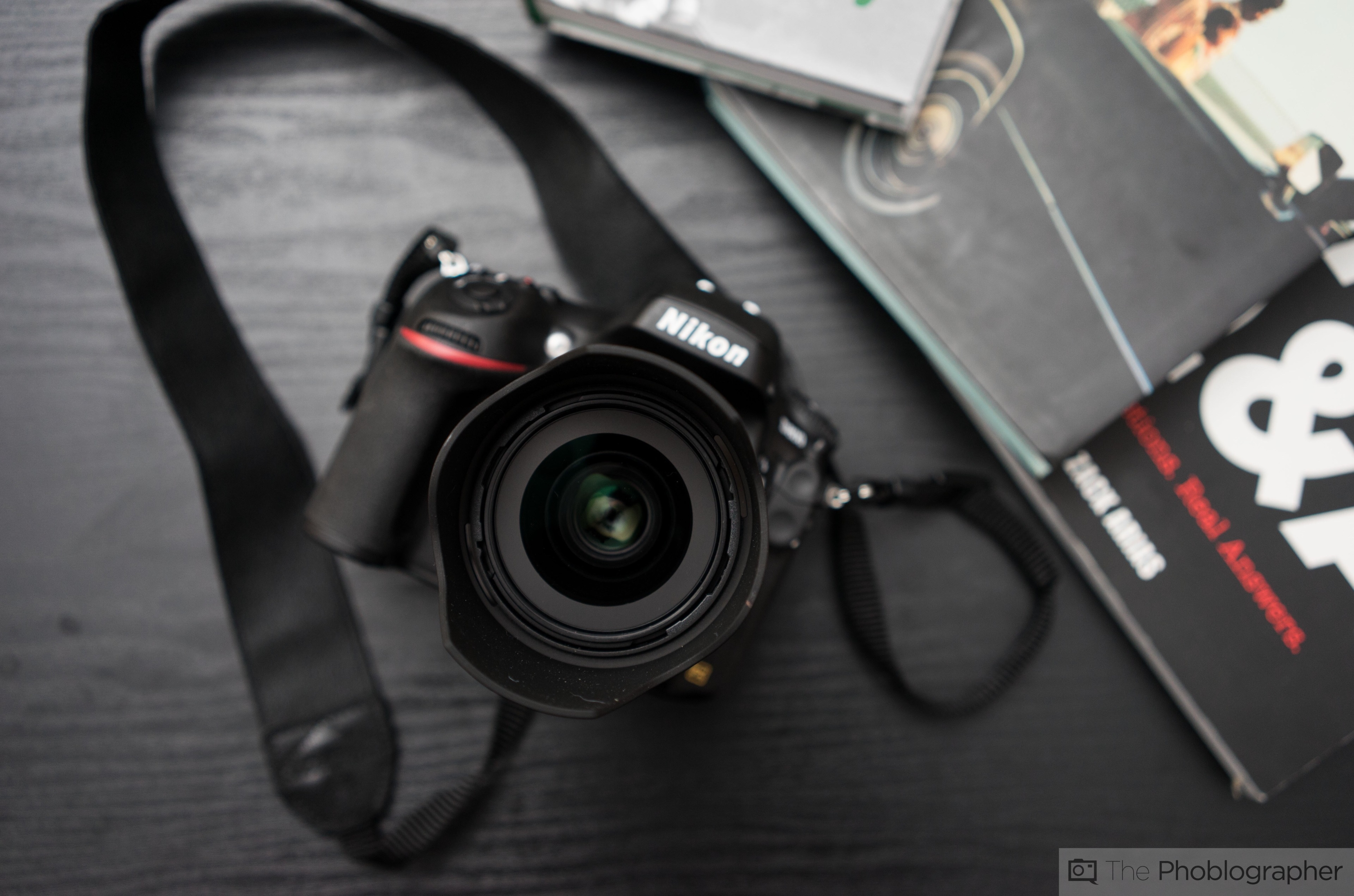 Nikon D750 camera with lens and books HD Wallpaper