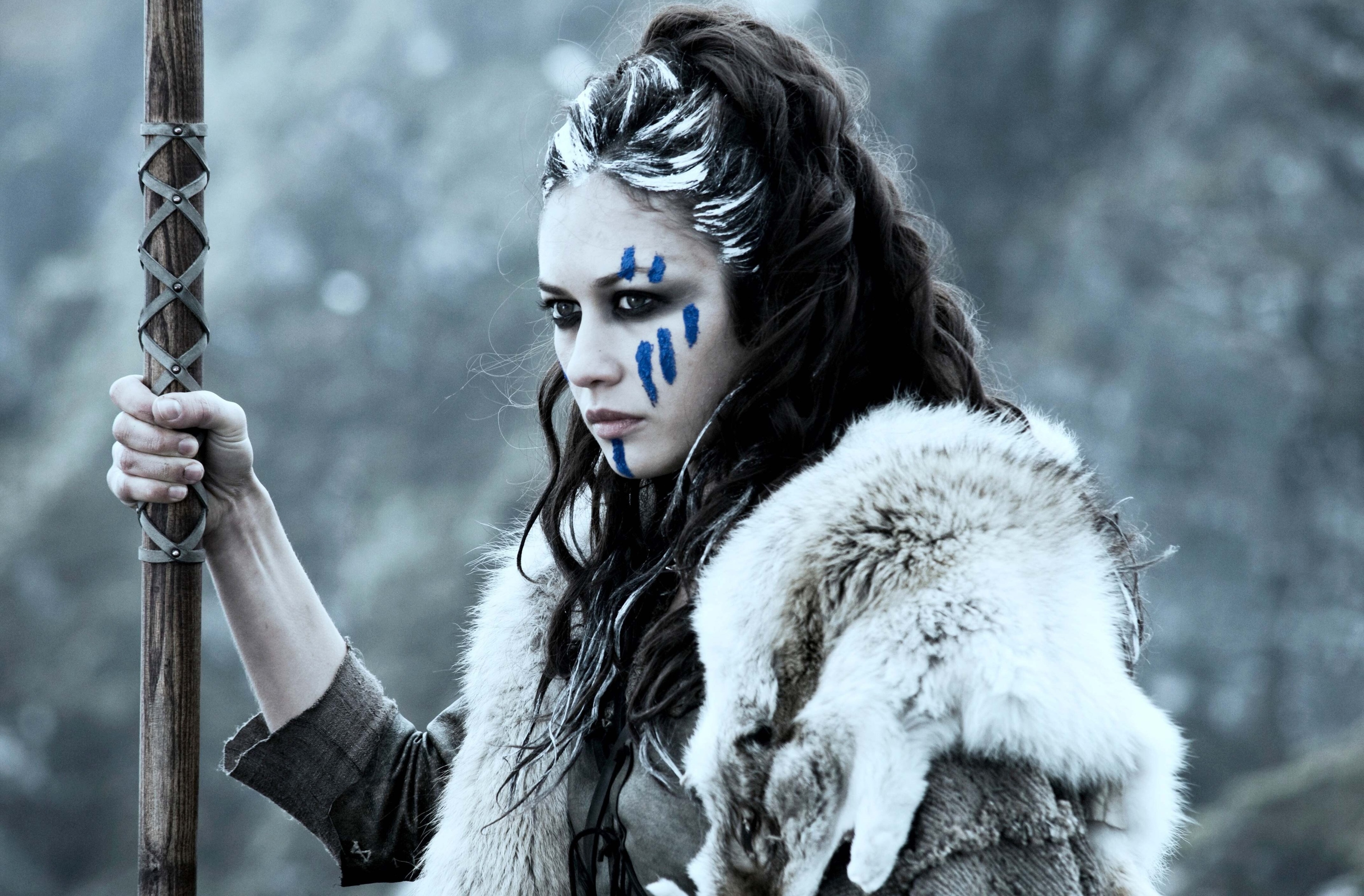 Olga Kurylenko with war paint and fur HD Wallpaper